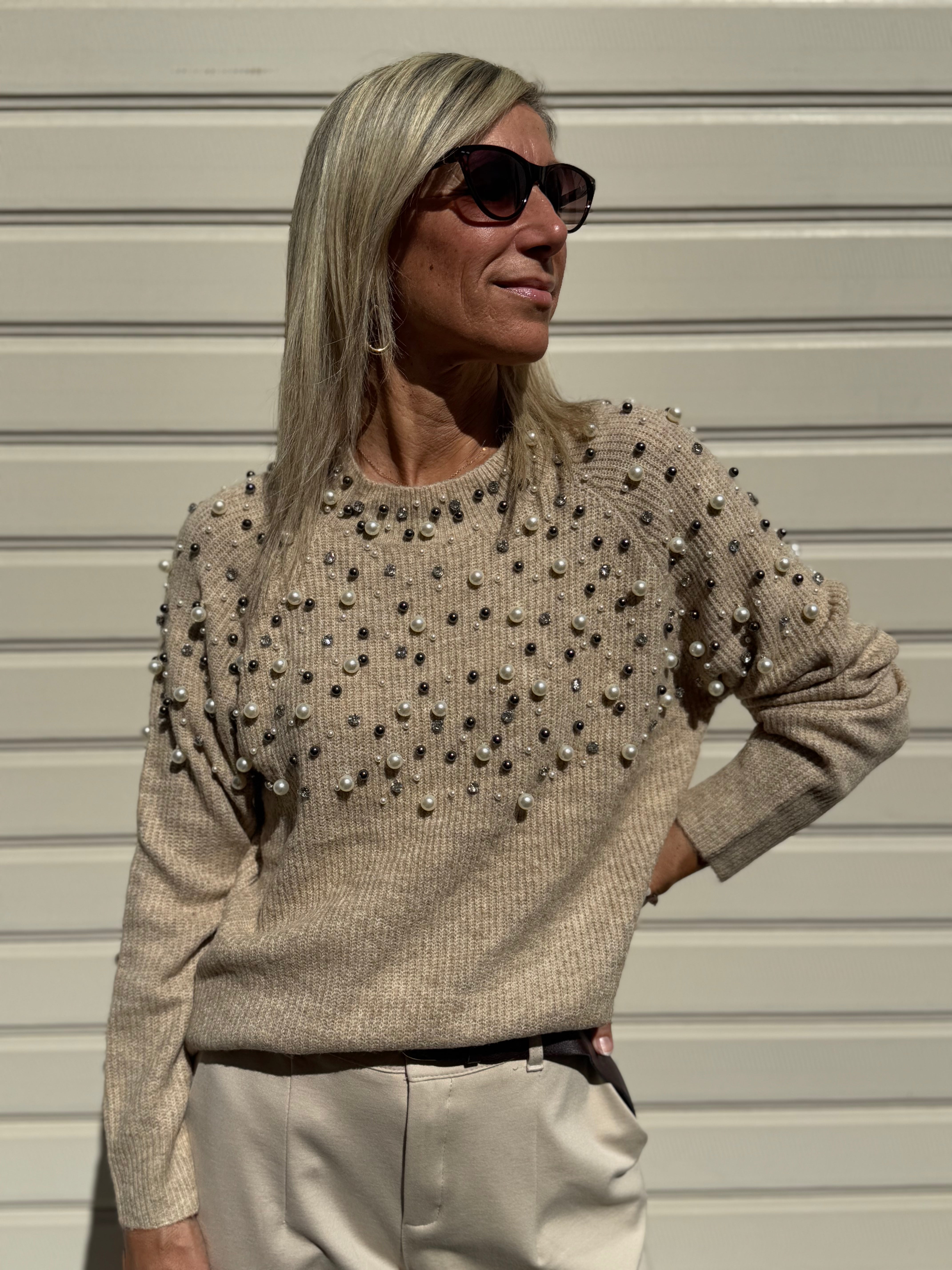 Maglia con perle artigli