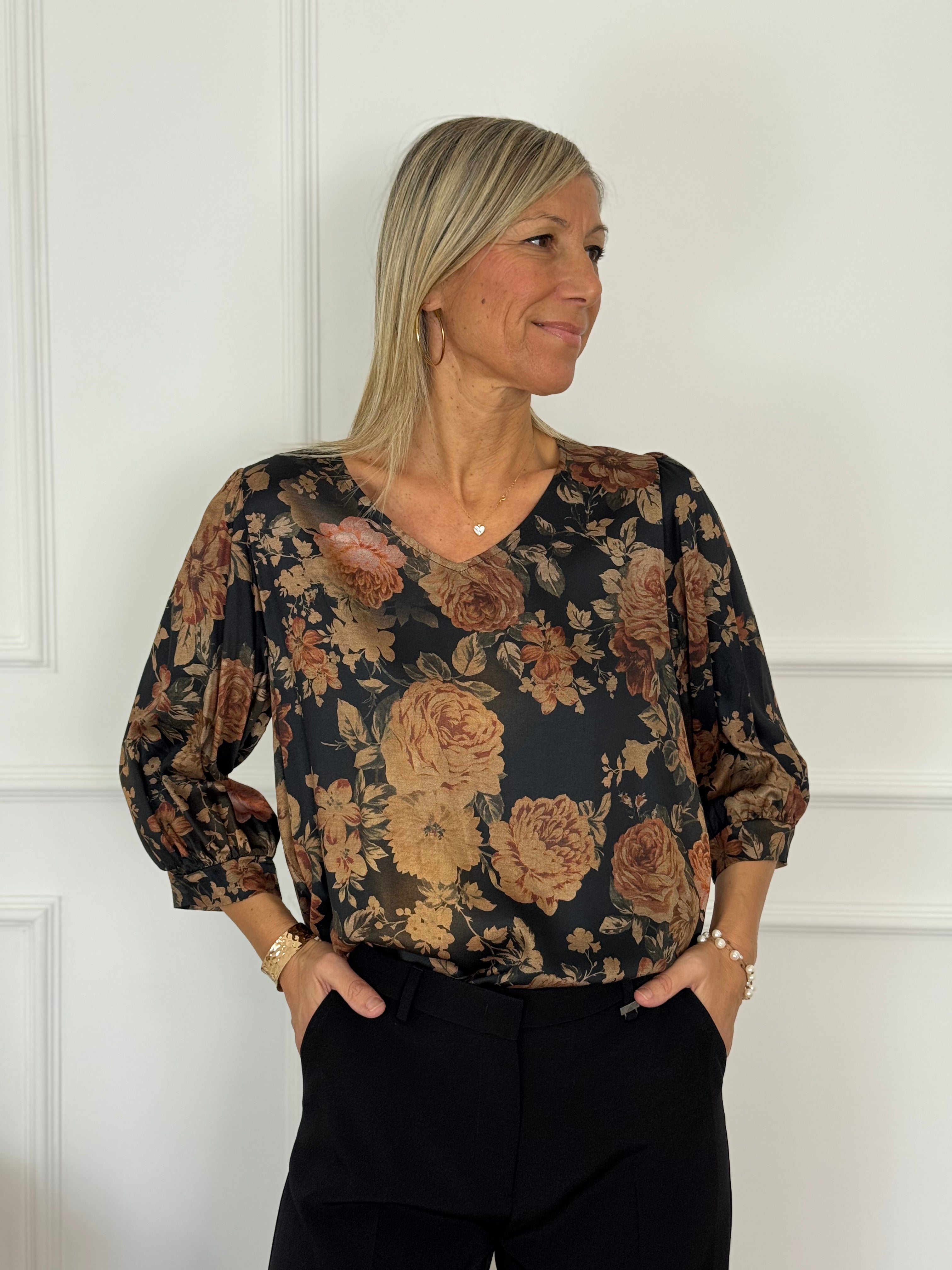 Blusa scollo V fantasia artigli