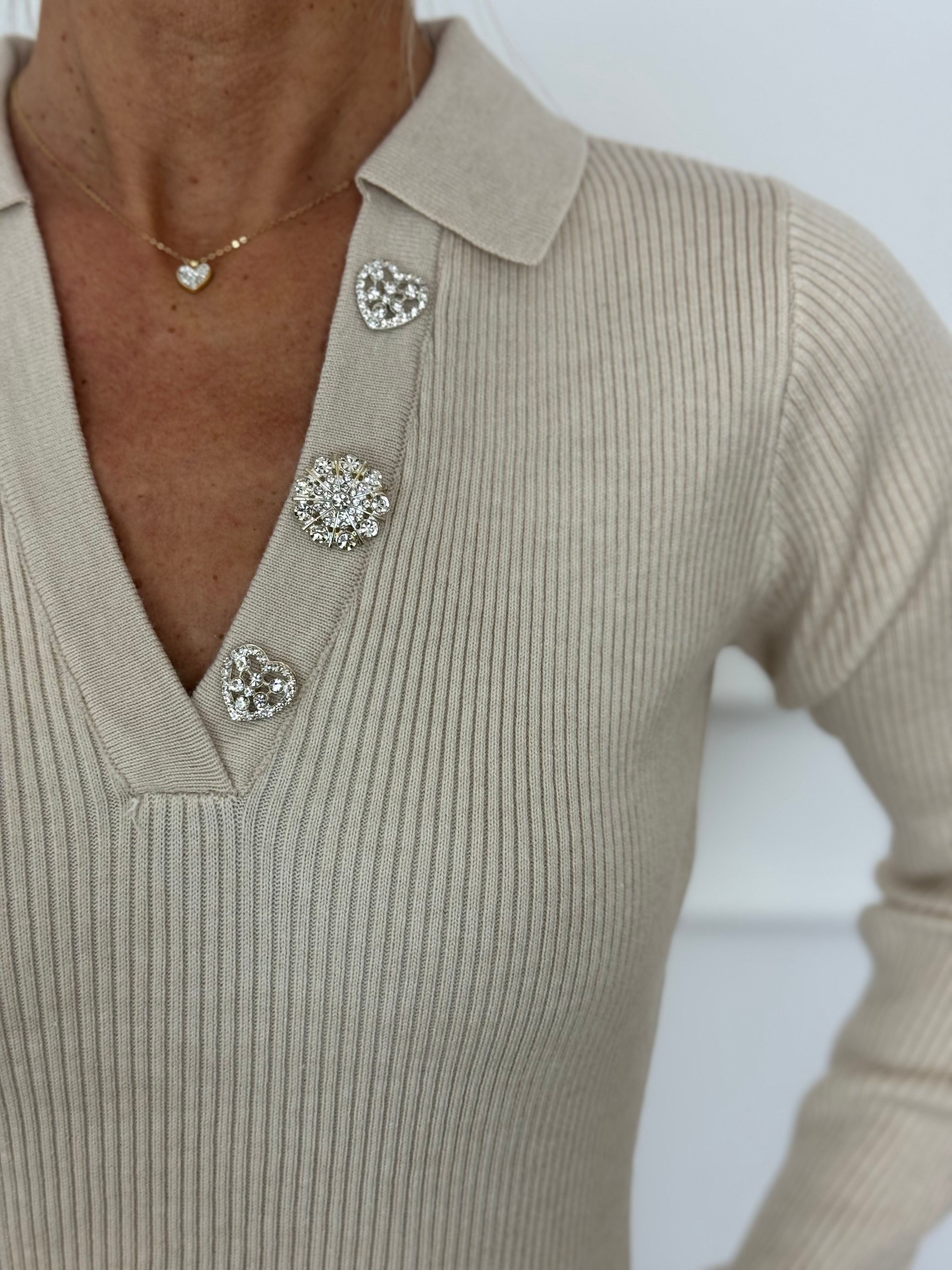 Polo bottoni strass artigli