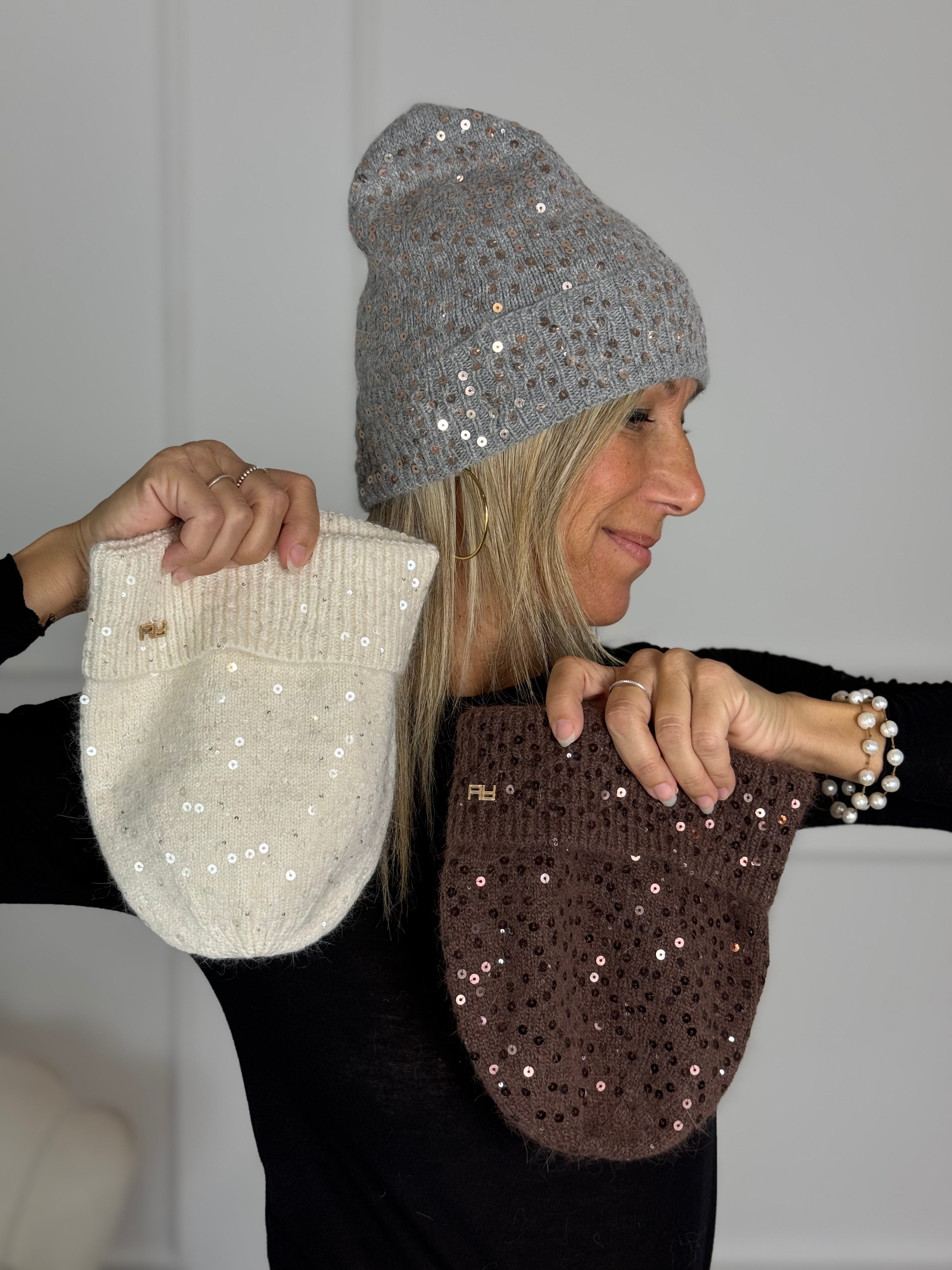 Cuffia paillettes artigli