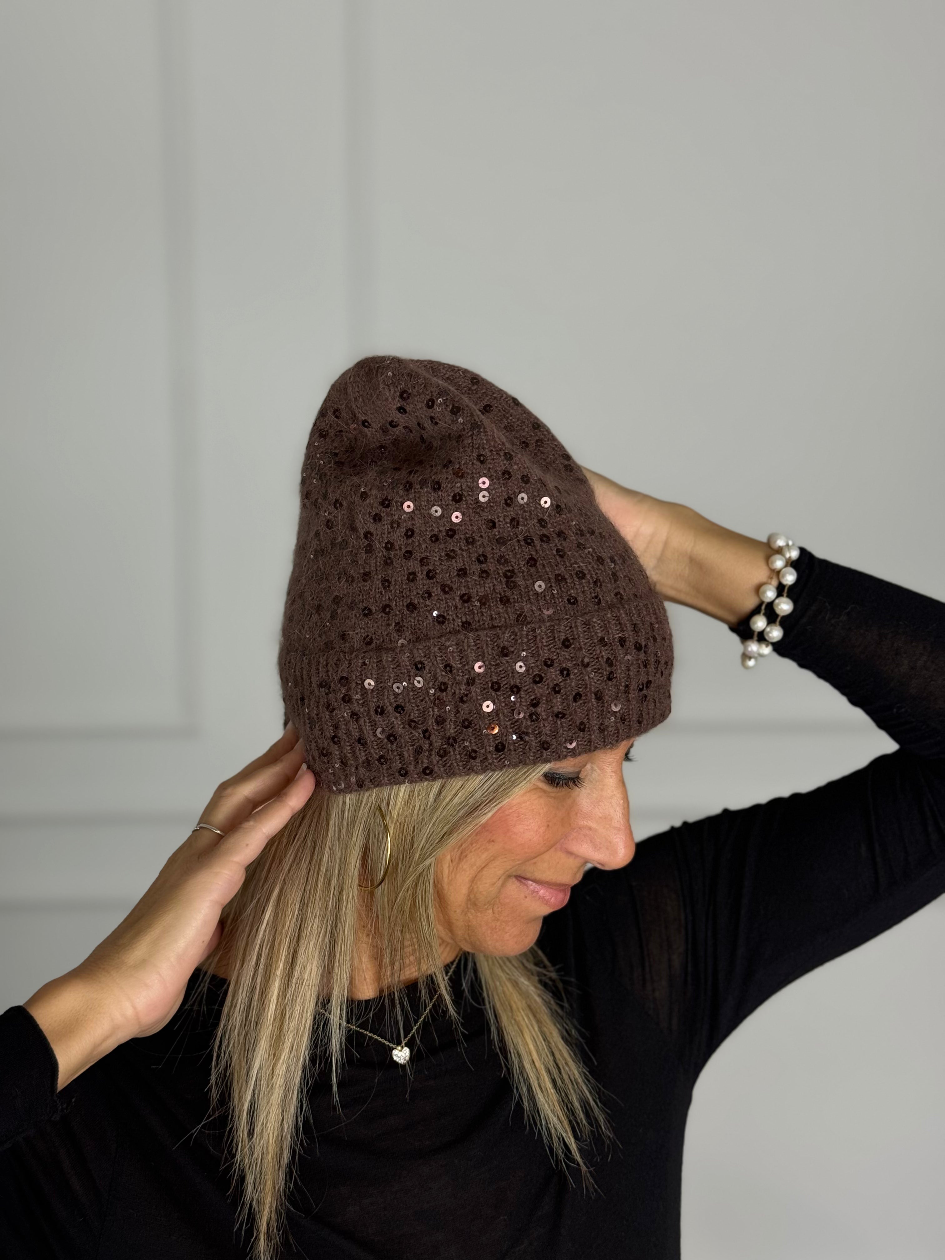 Cuffia paillettes artigli