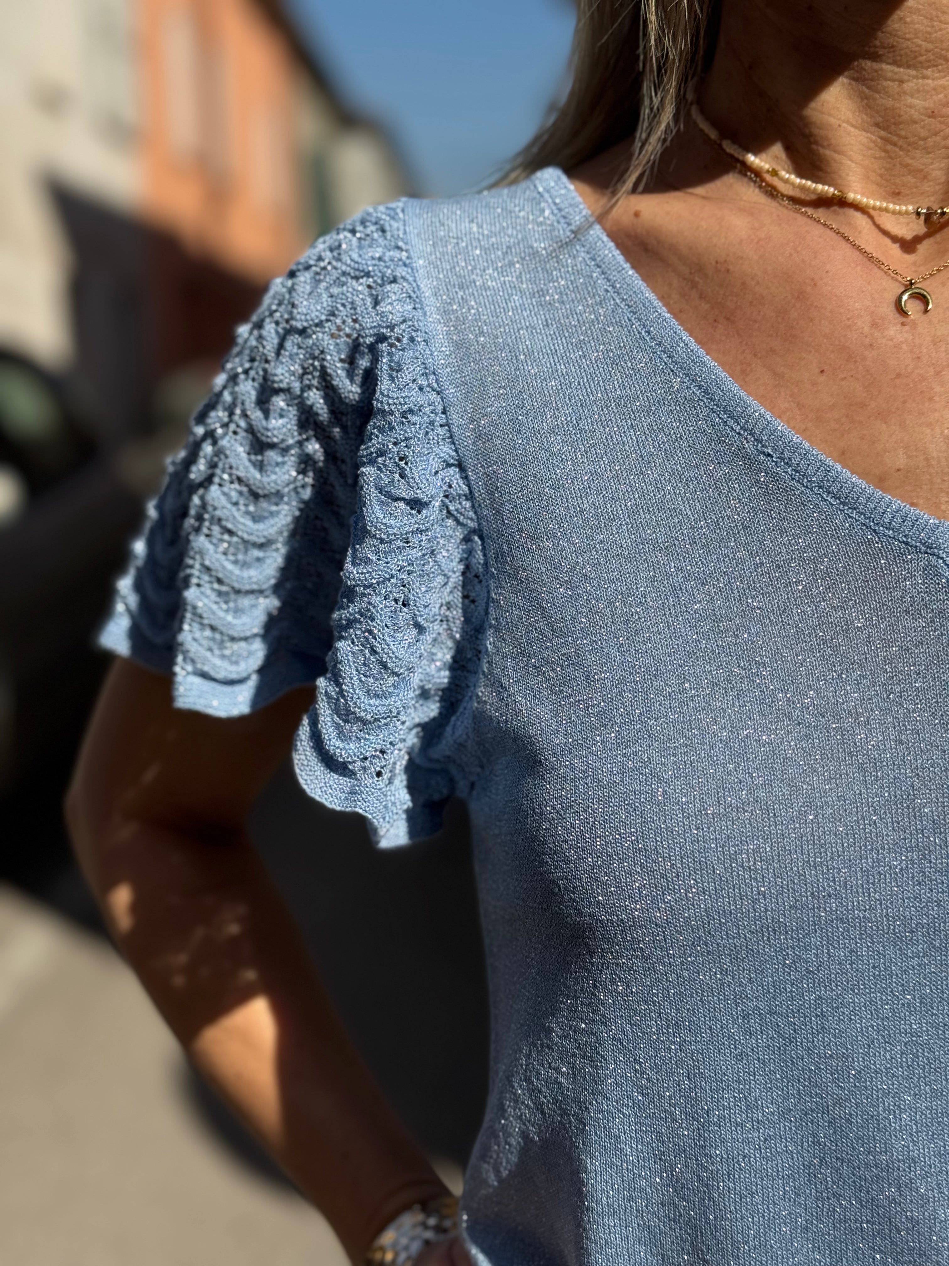 Maglia manica farfalla artigli