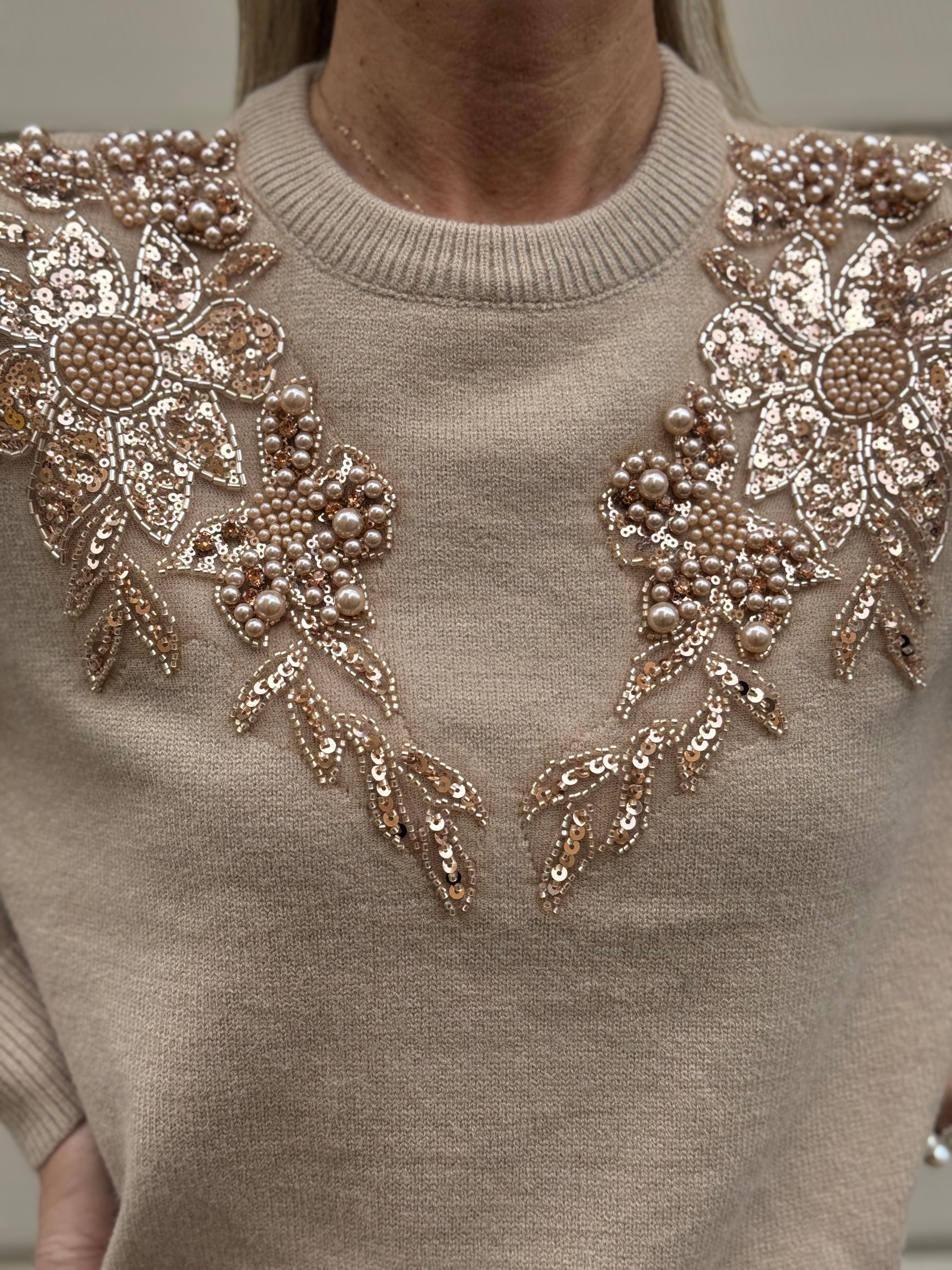 Maglia girocollo perle artigli