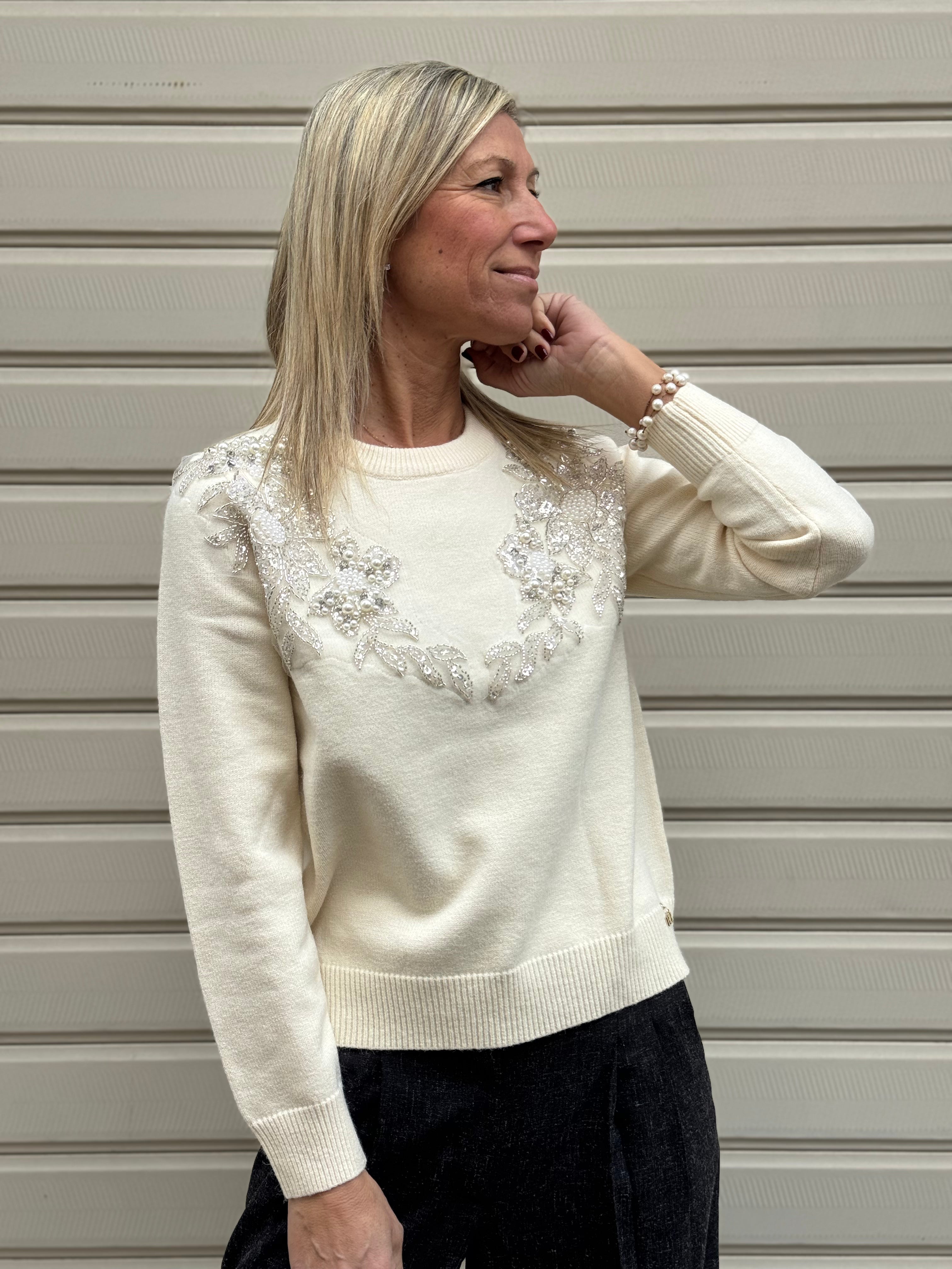 Maglia girocollo perle artigli