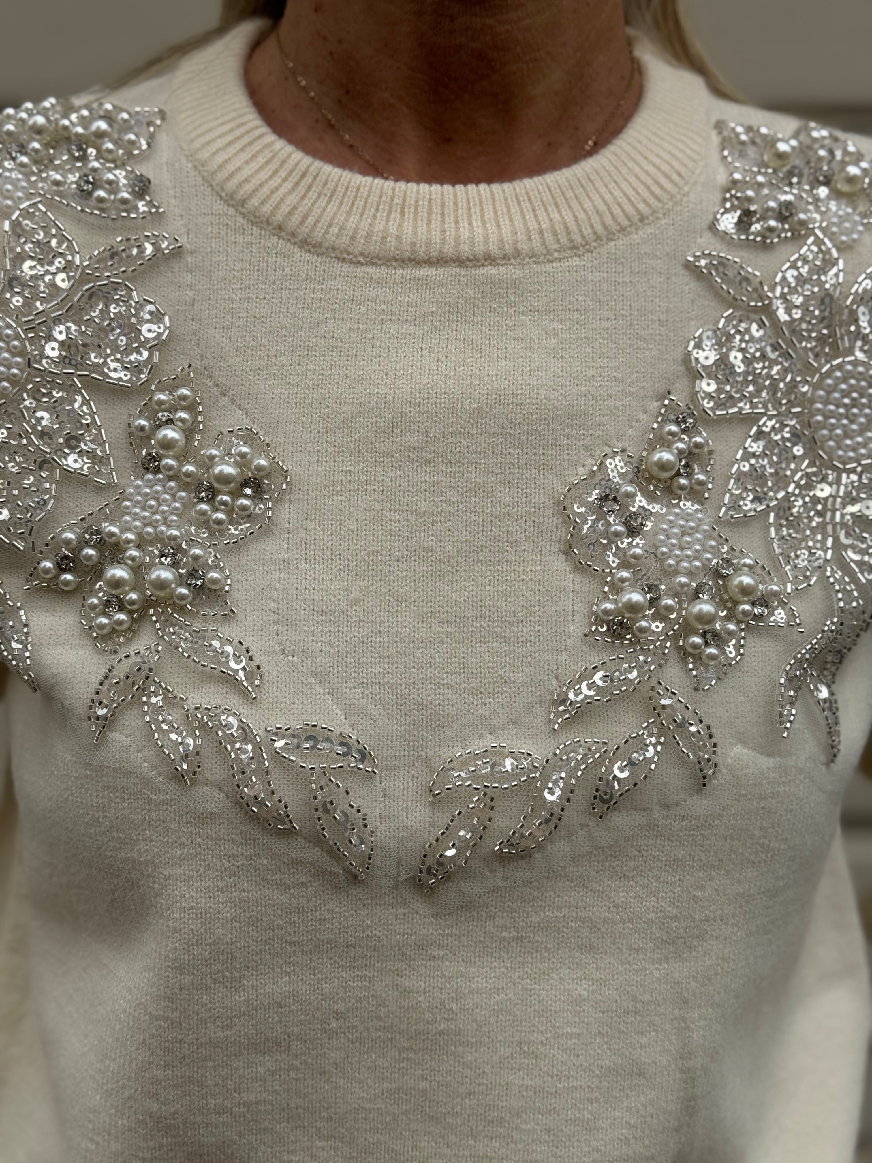 Maglia girocollo perle artigli