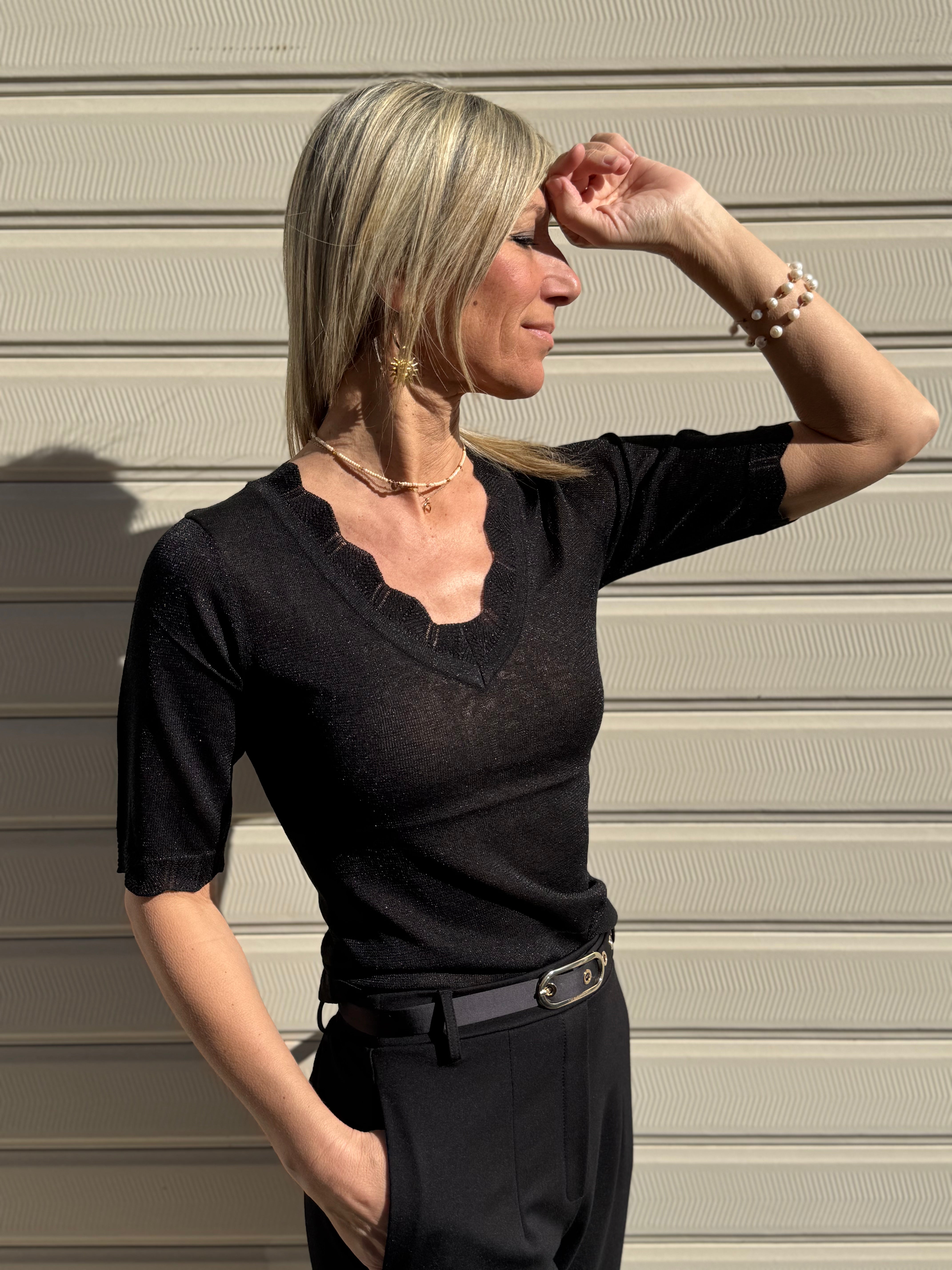 Maglia scollo v ondine artigli