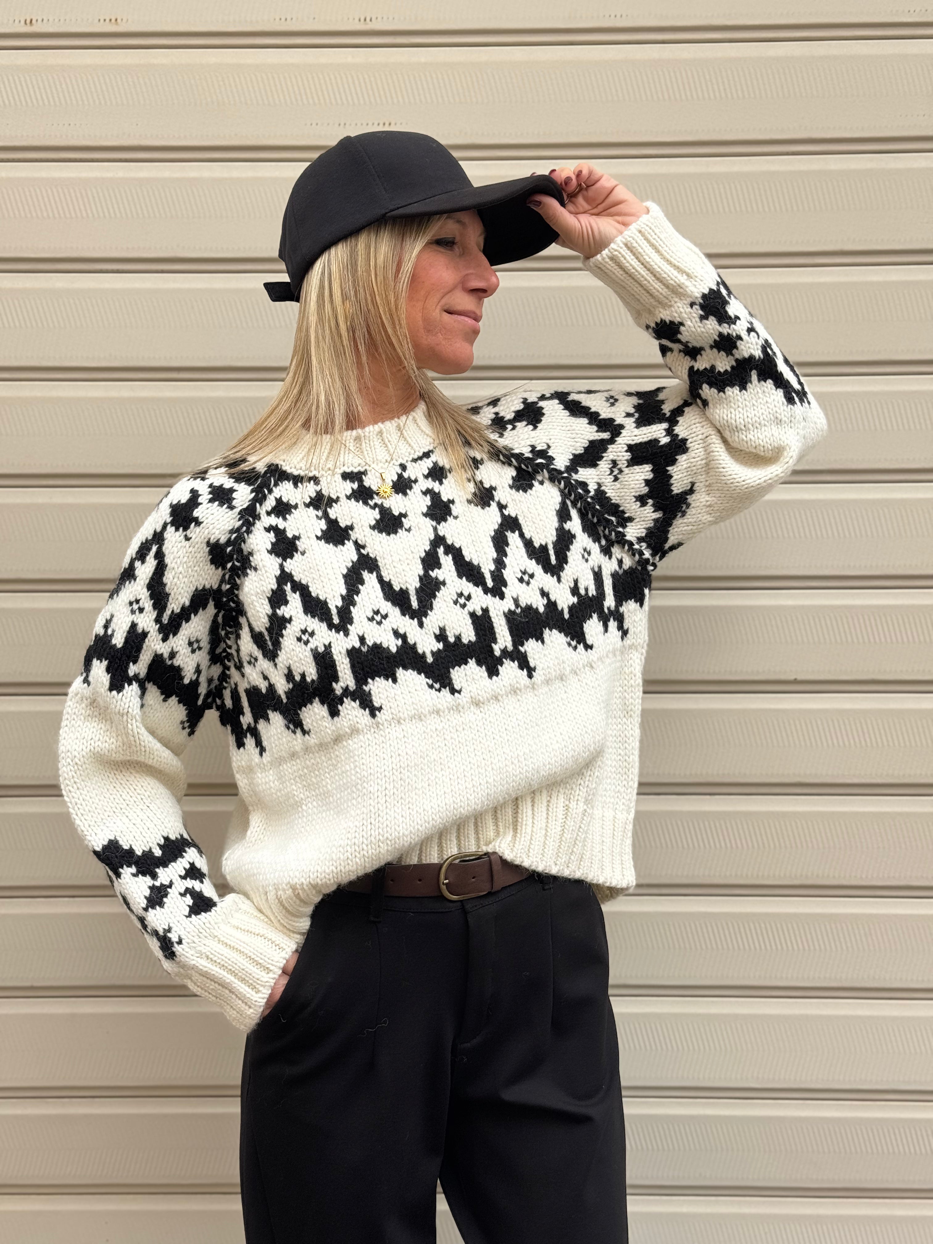 Maglione fiocco kontatto