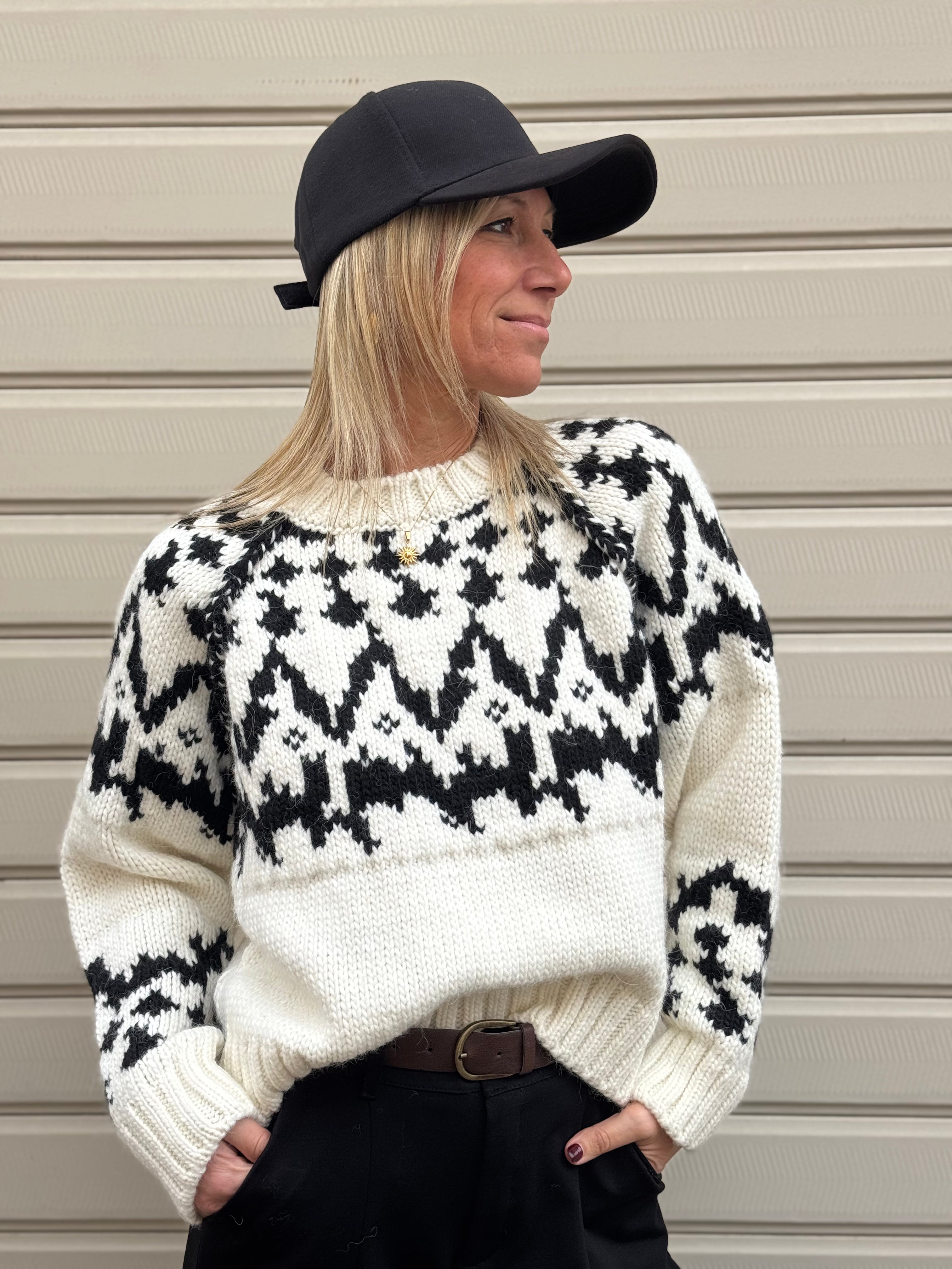 Maglione fiocco kontatto