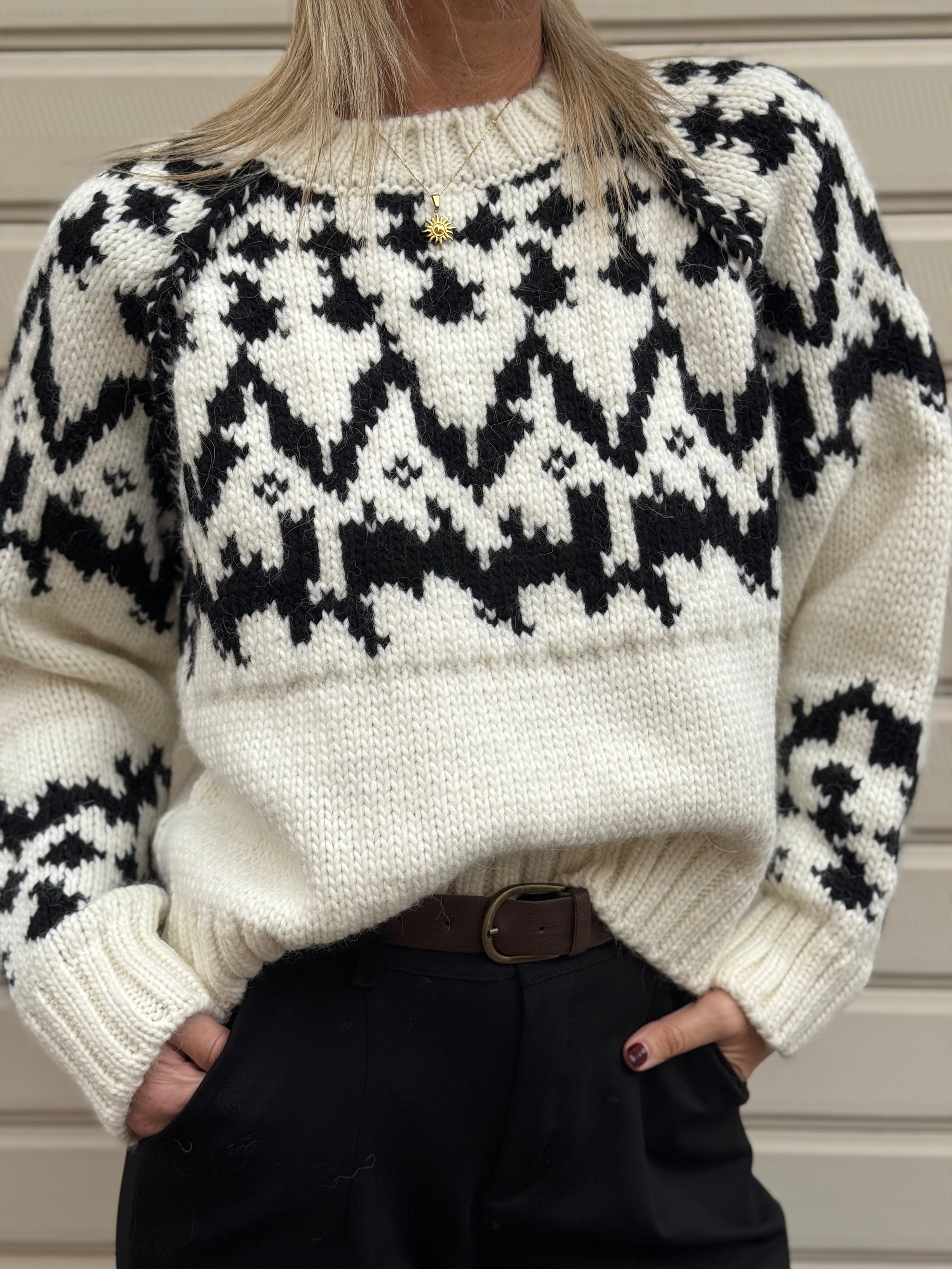 Maglione fiocco kontatto