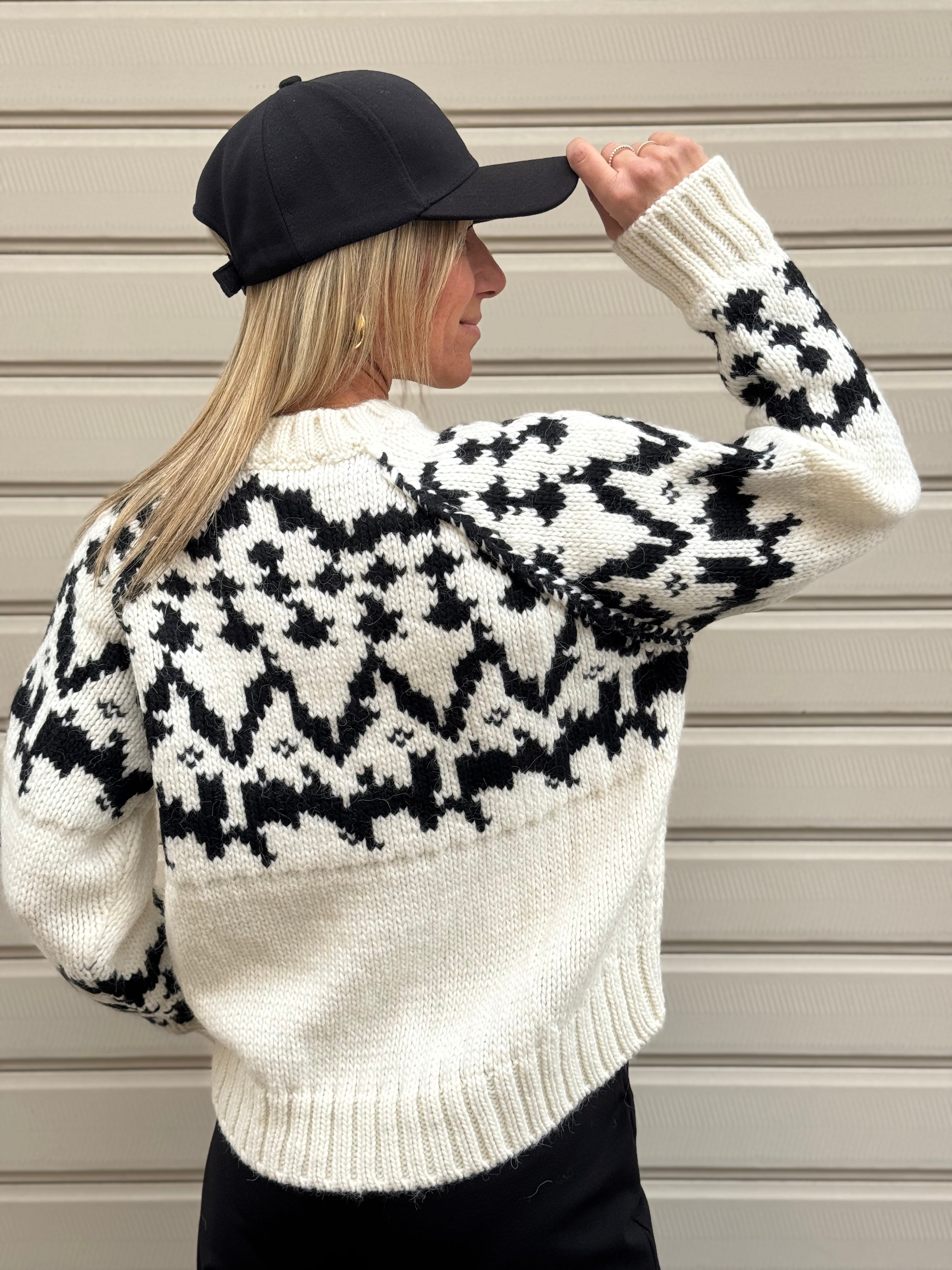 Maglione fiocco kontatto