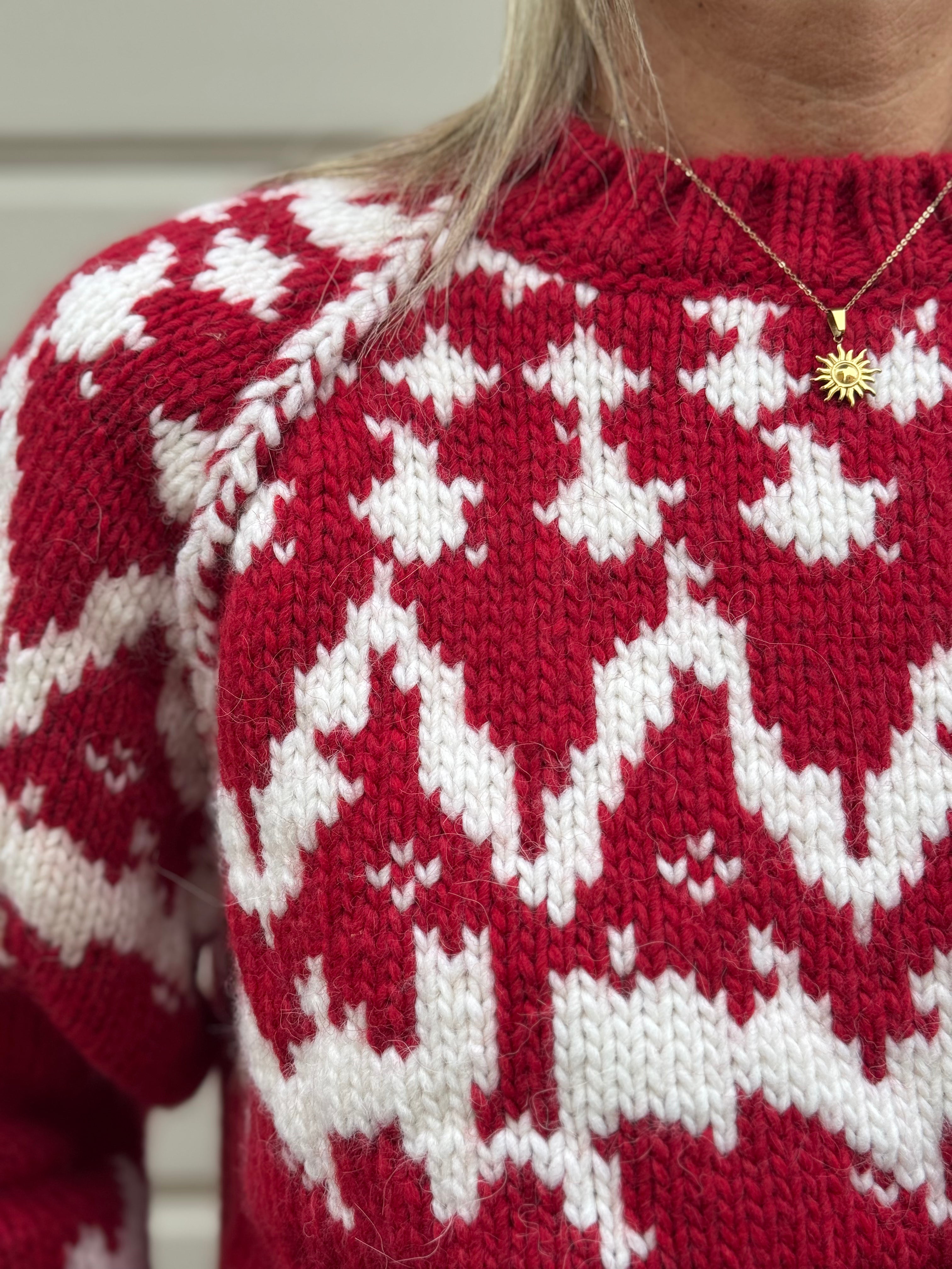 Maglione fiocco kontatto