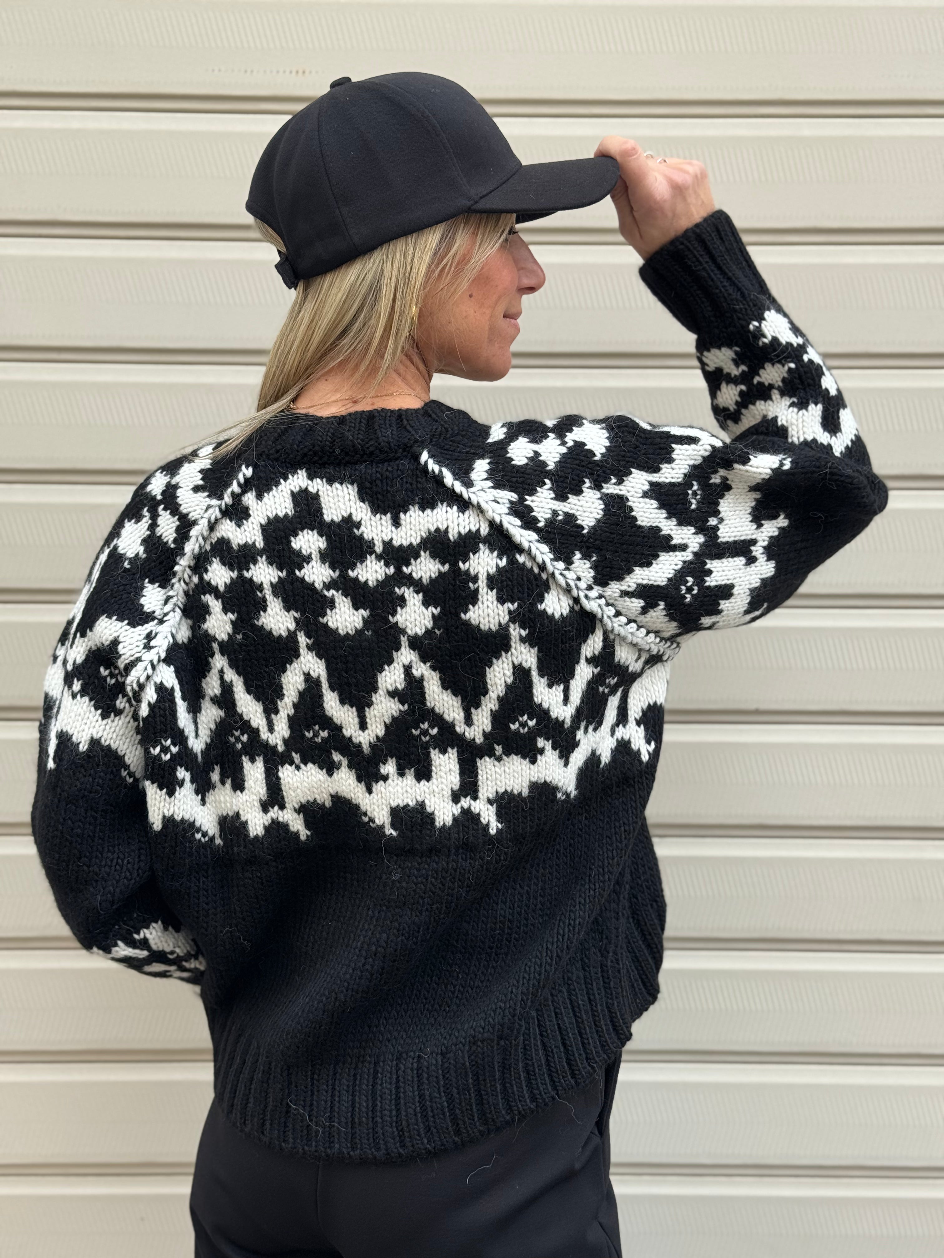 Maglione fiocco kontatto