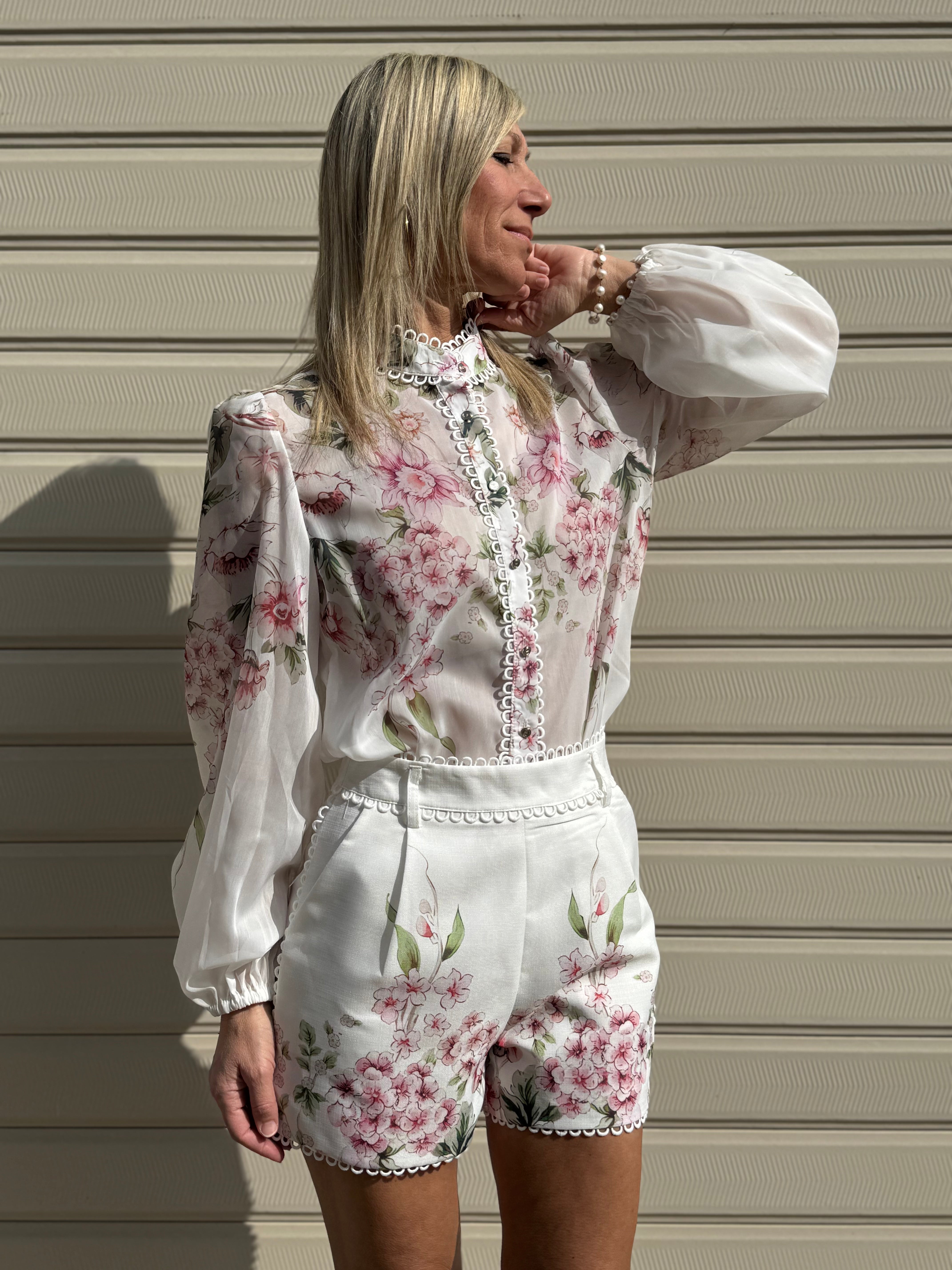 Shorts fiori di pesco artigli