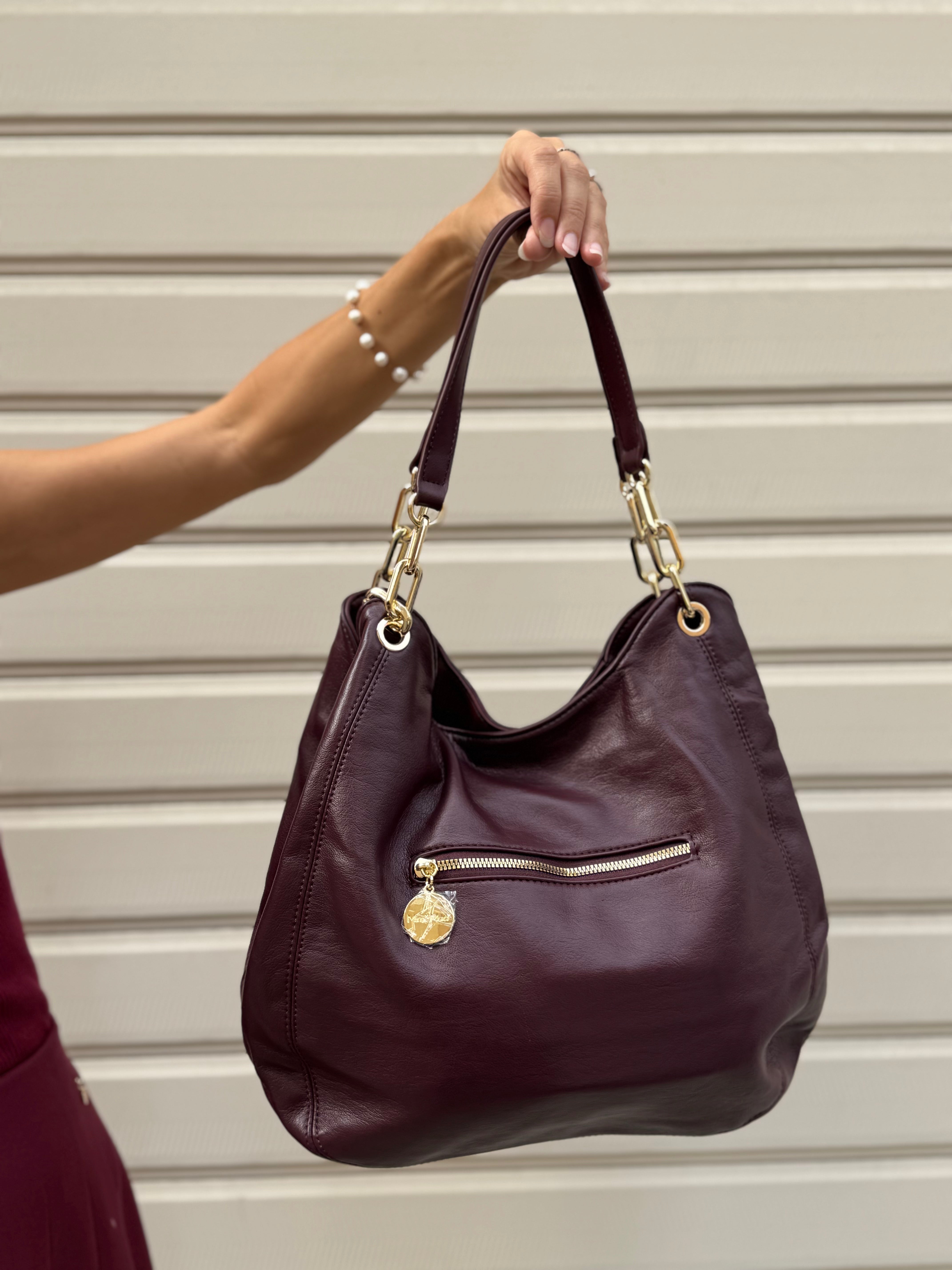 Borsa morbida con occhielli
