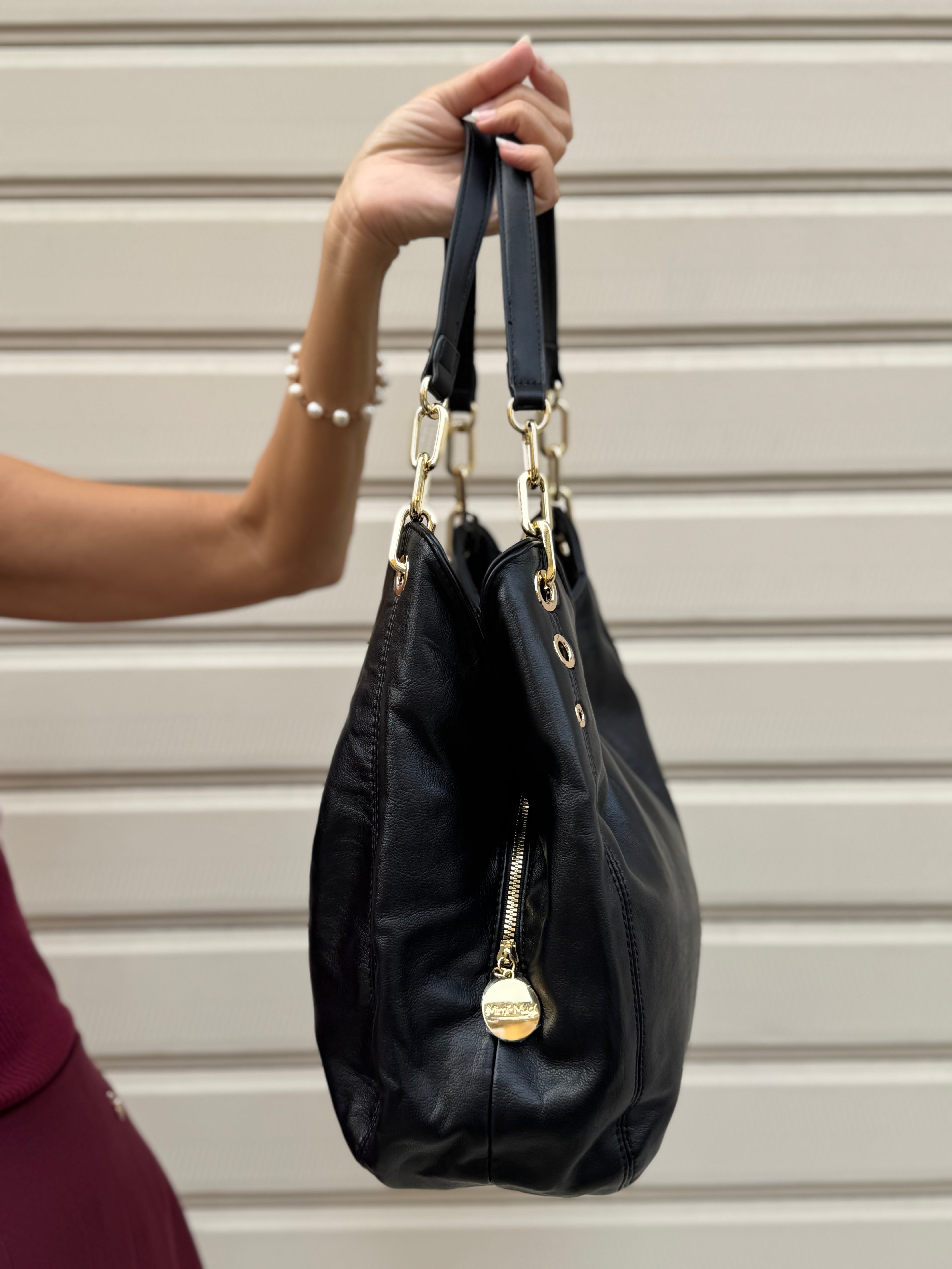 Borsa morbida con occhielli