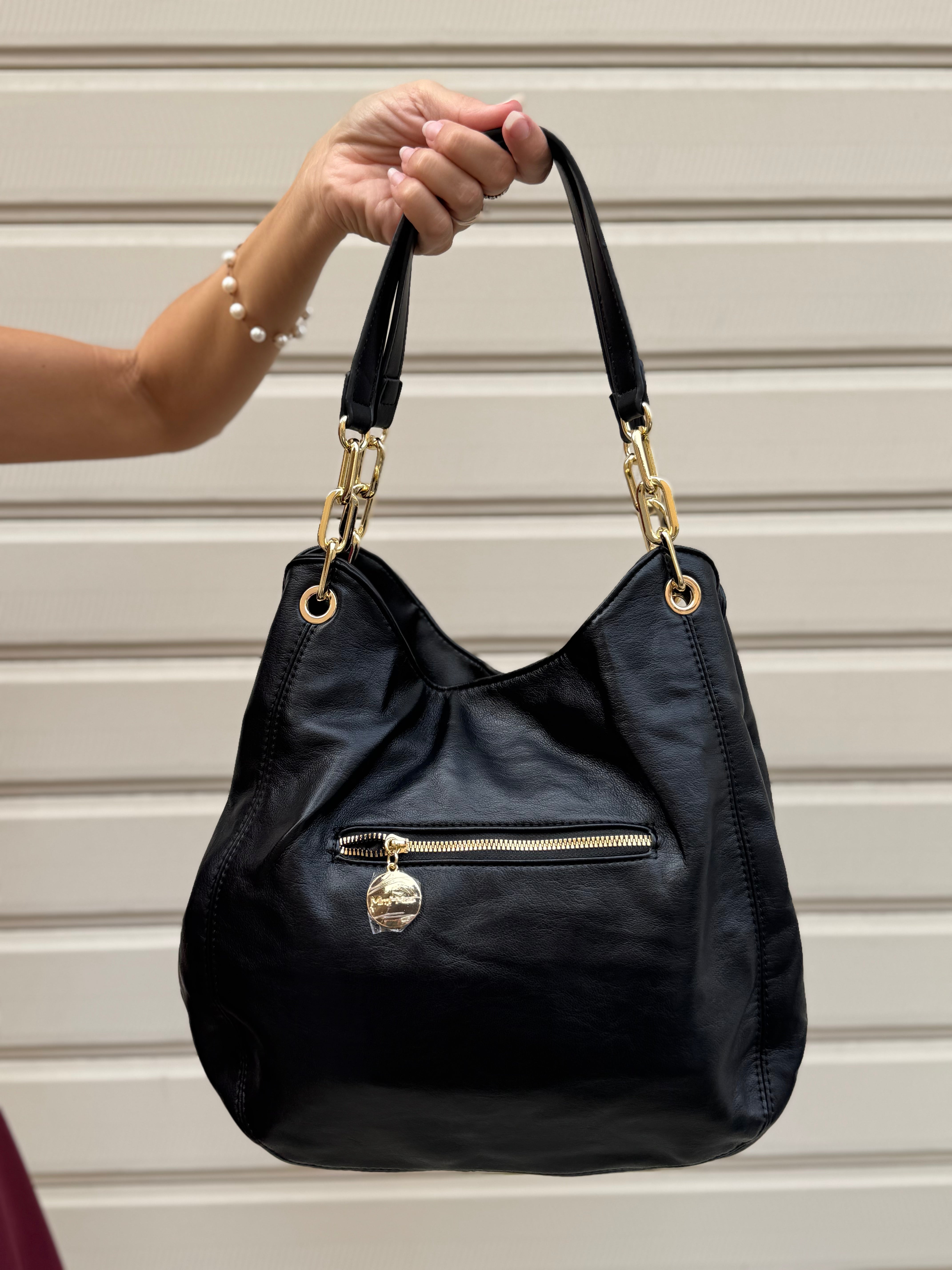 Borsa morbida con occhielli
