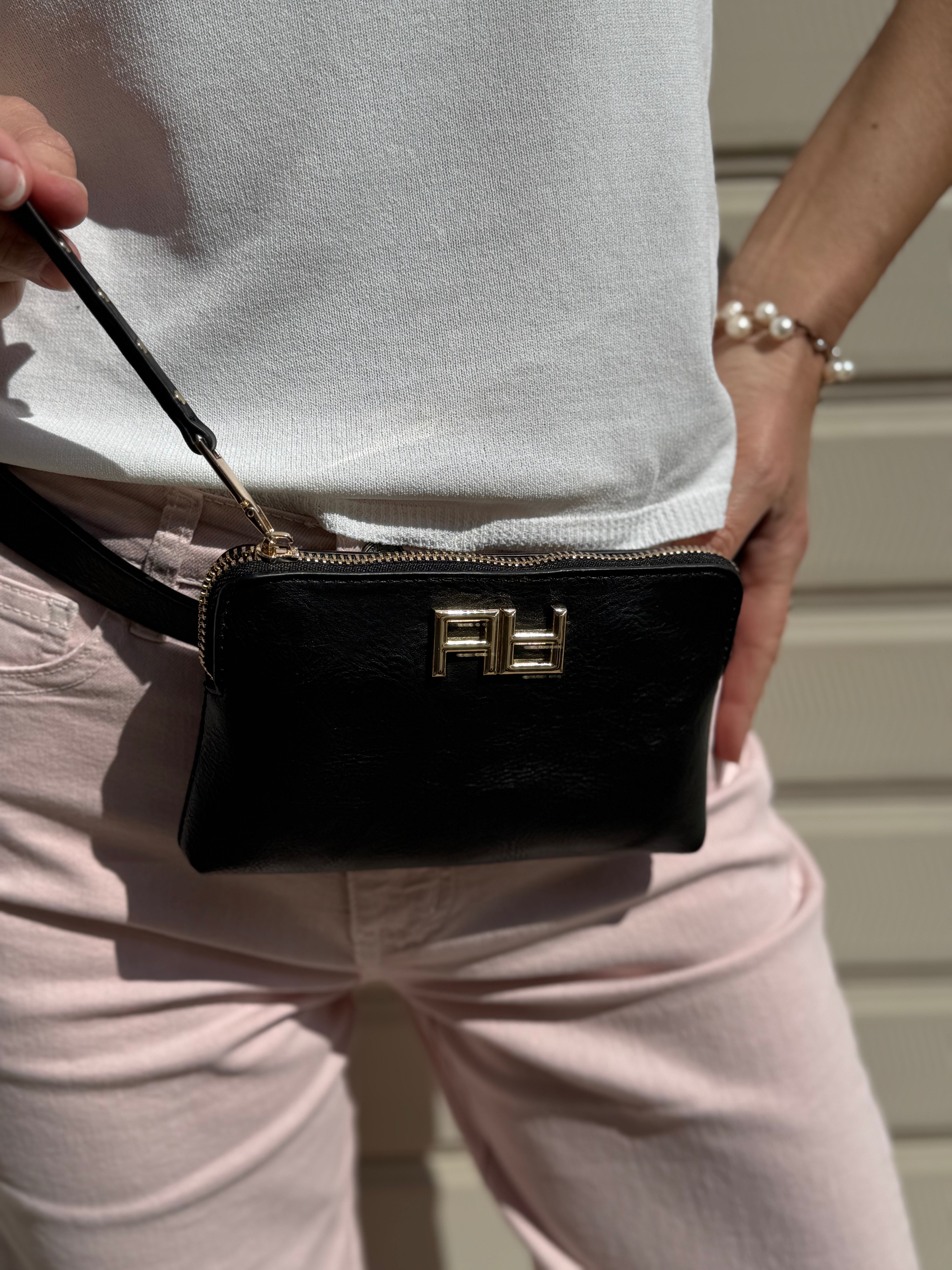 Pochette con cintura artigli