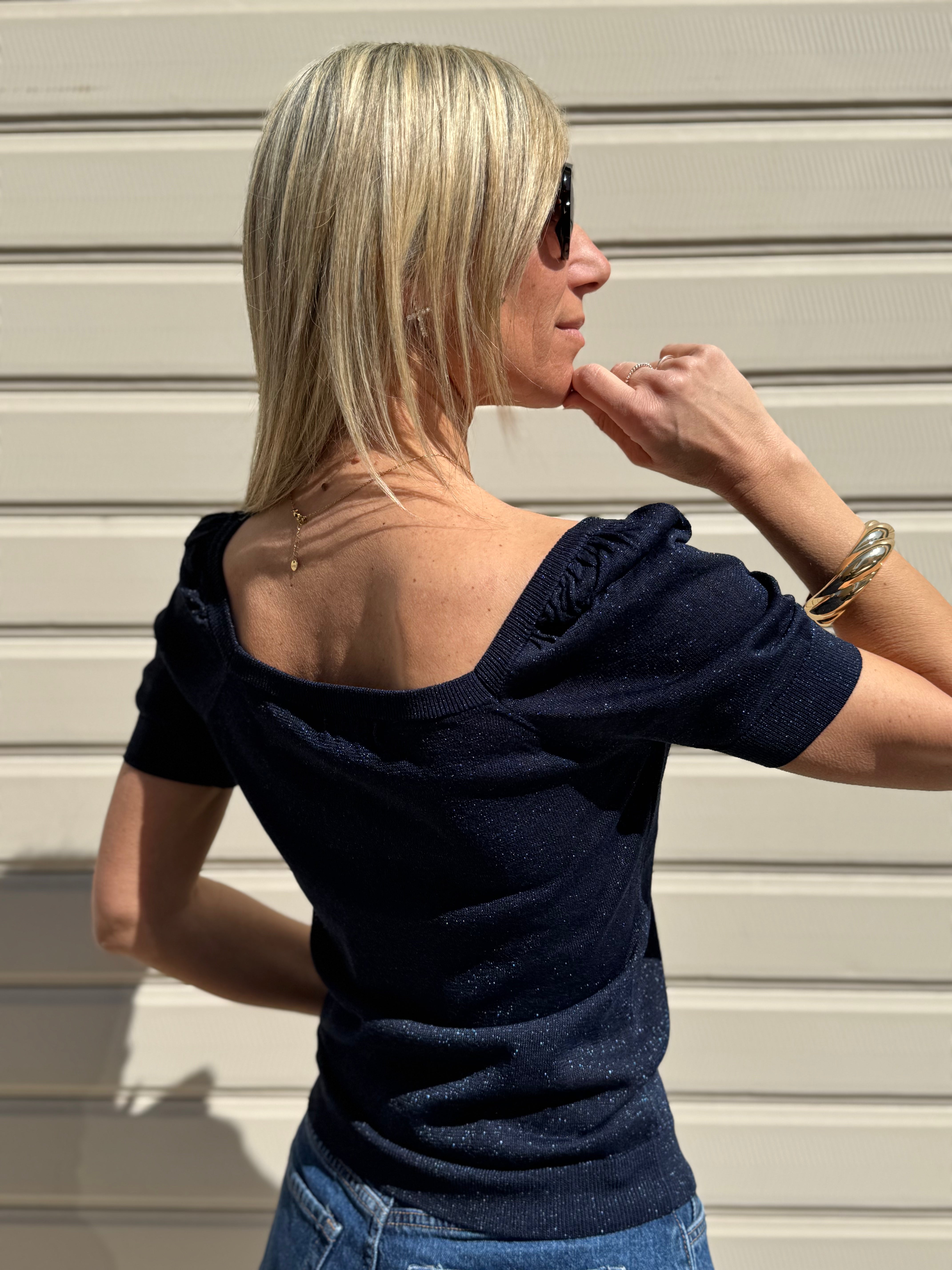 Maglia manica sbuffo artigli