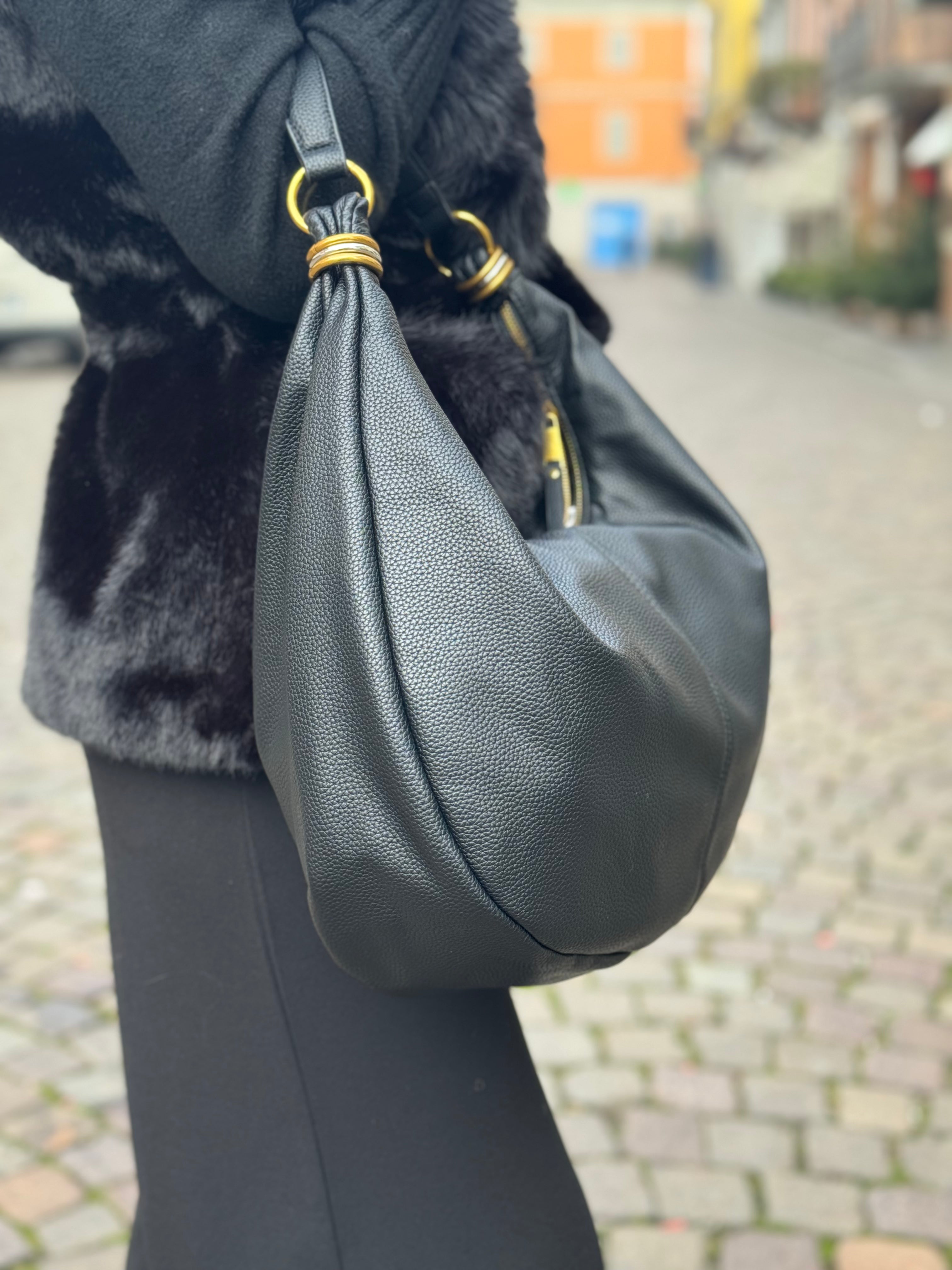 Borsa con anelli sui manici