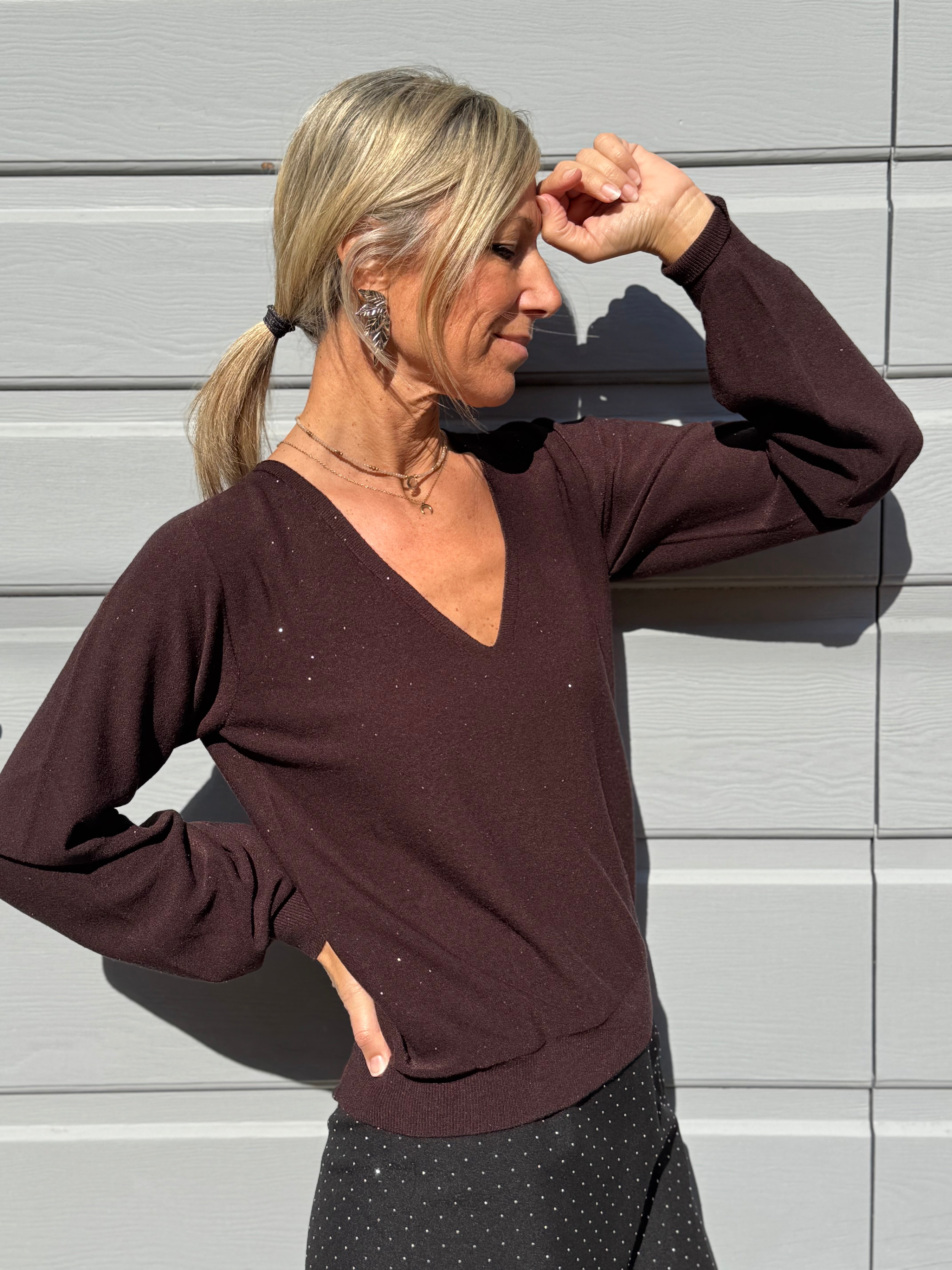 Scollo v glitter Kontatto