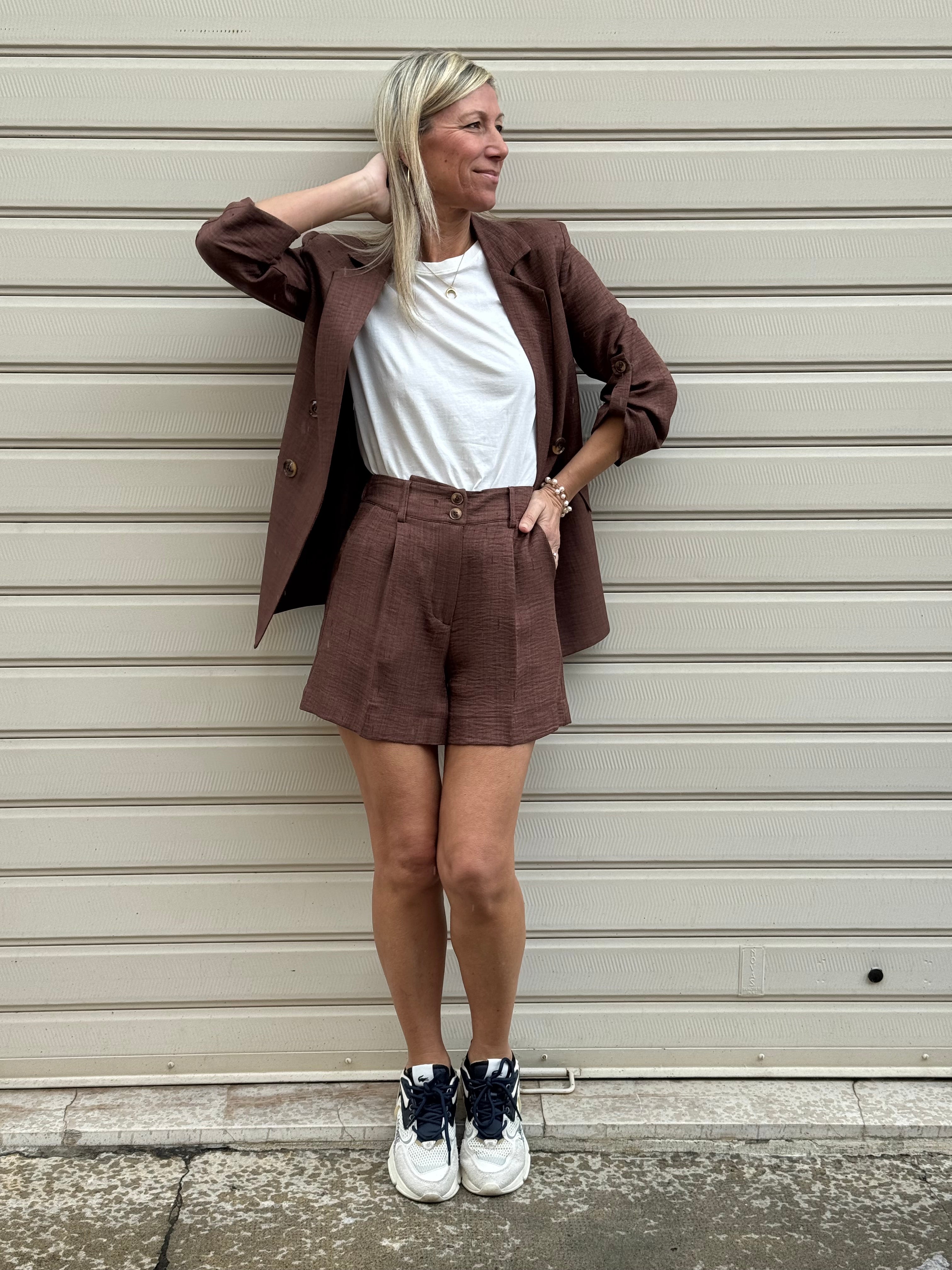 Shorts due bottoni artigli