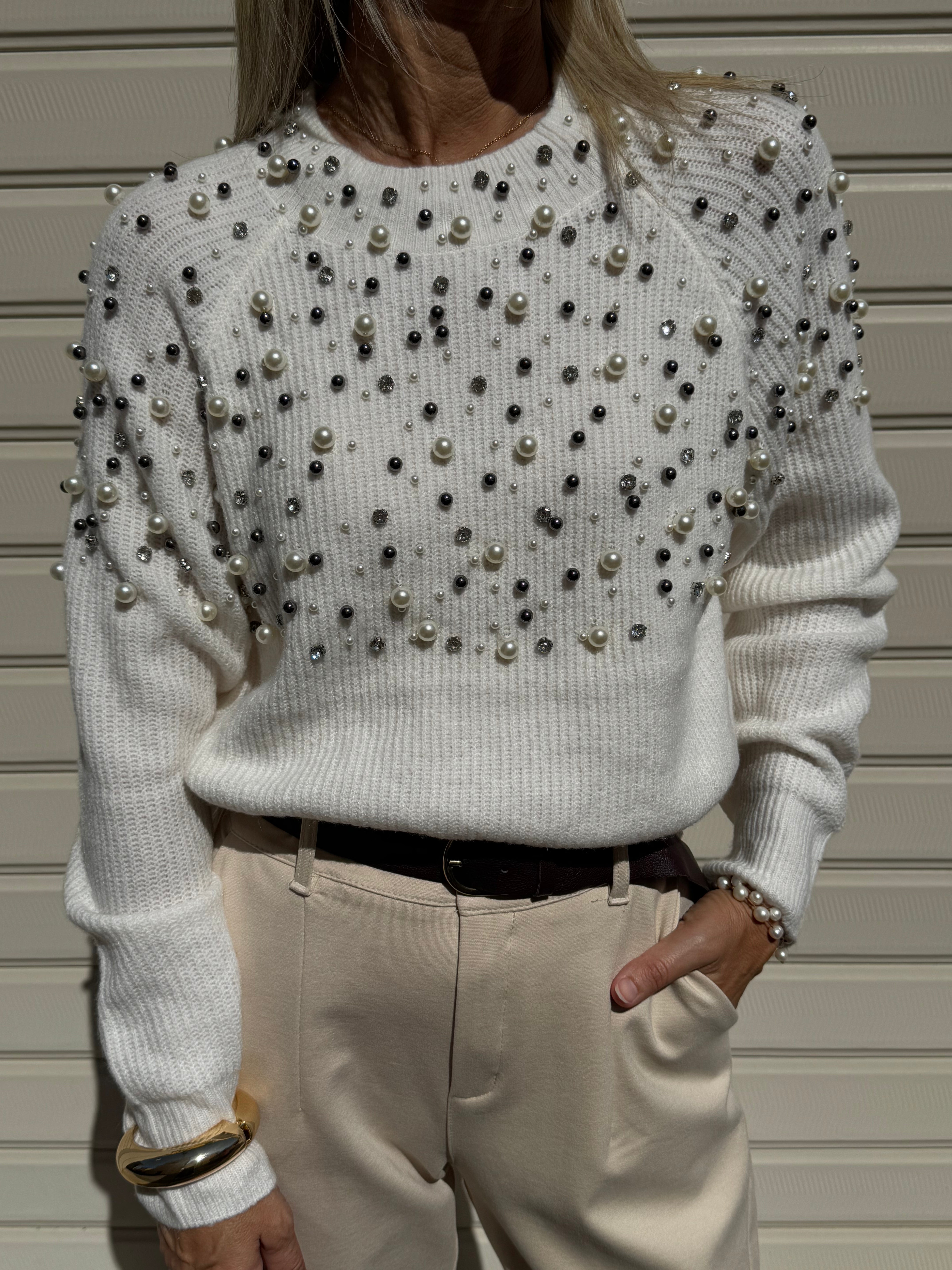 Maglia con perle artigli