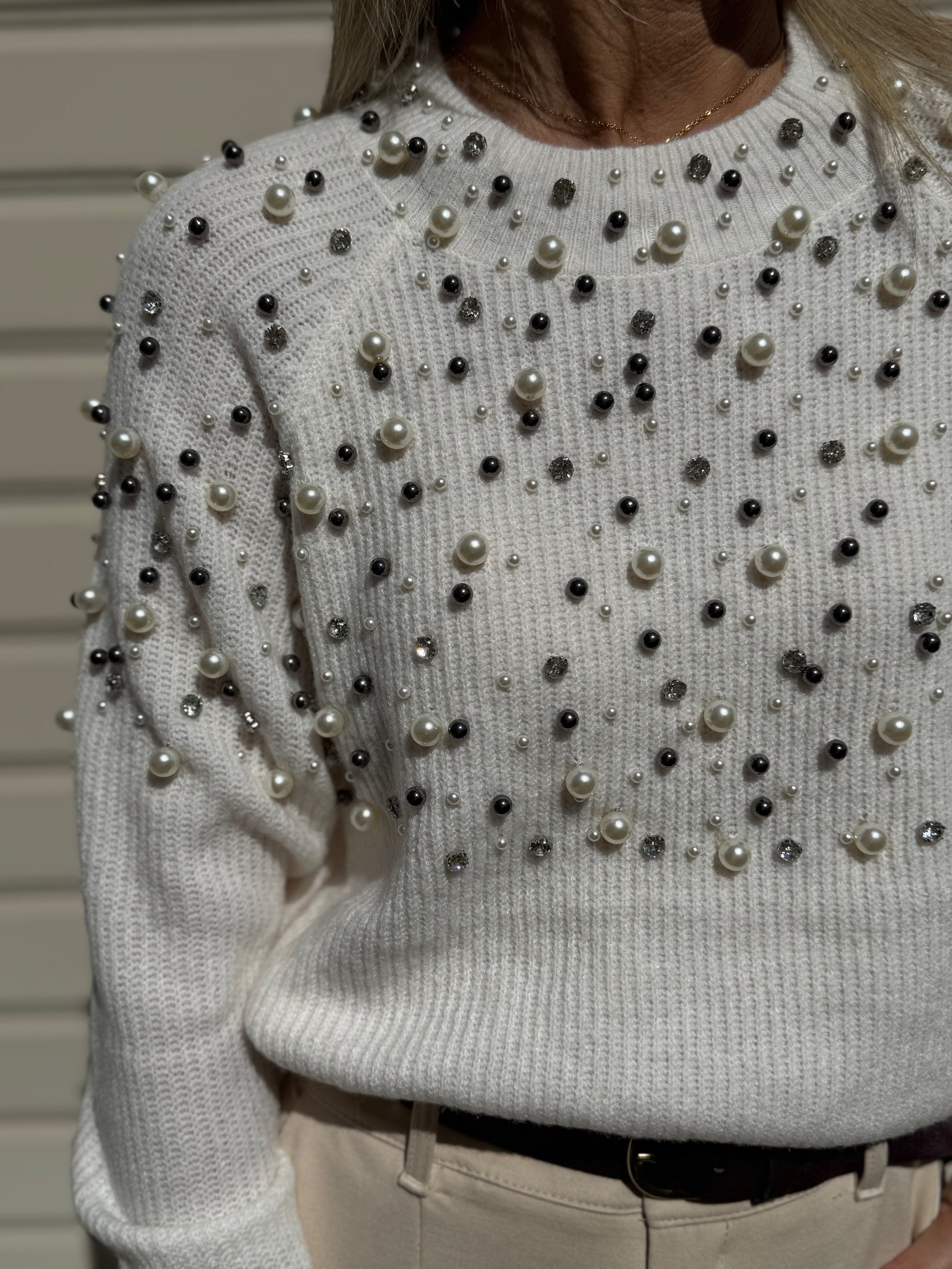 Maglia con perle artigli