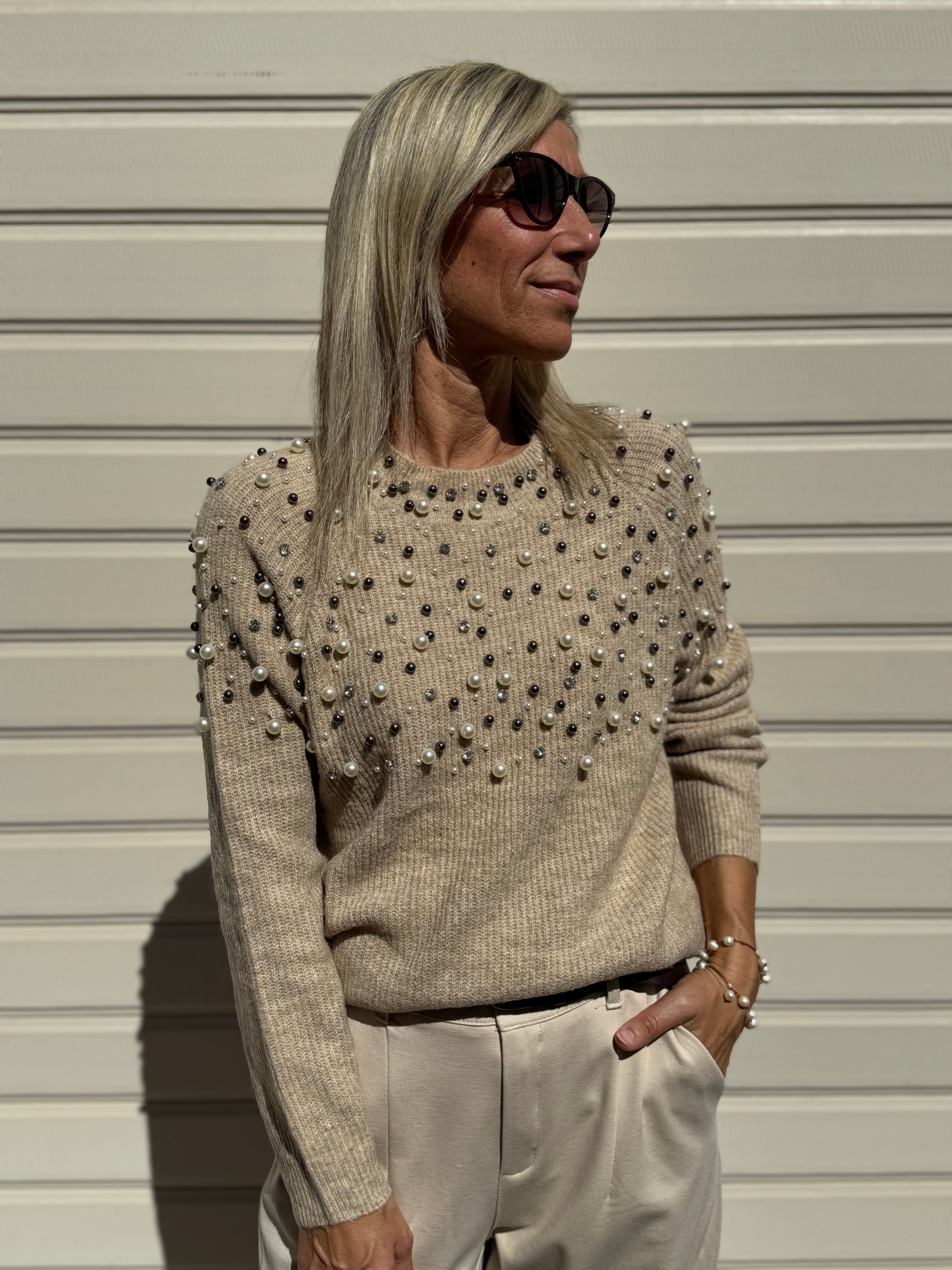 Maglia con perle artigli