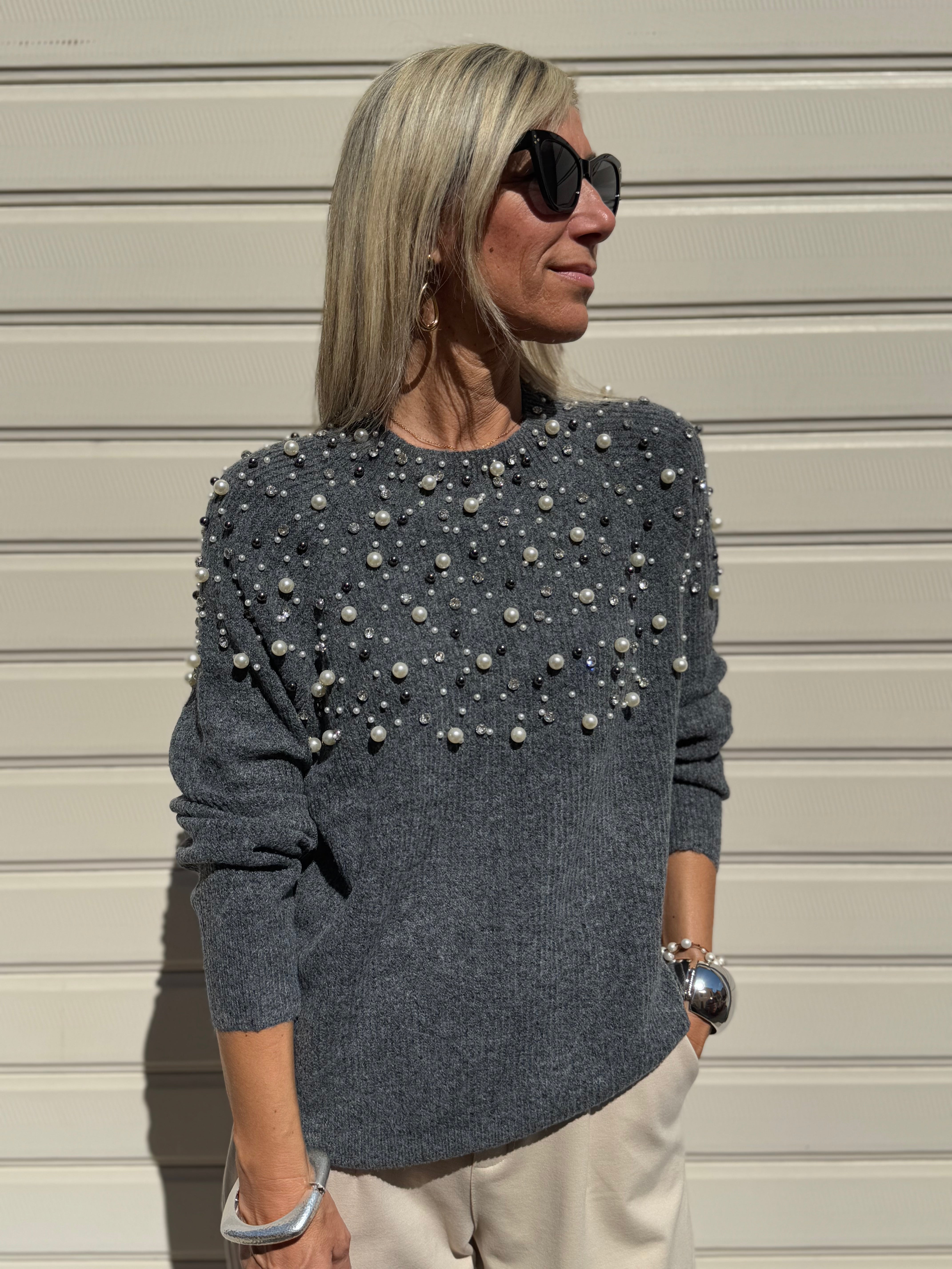 Maglia con perle artigli