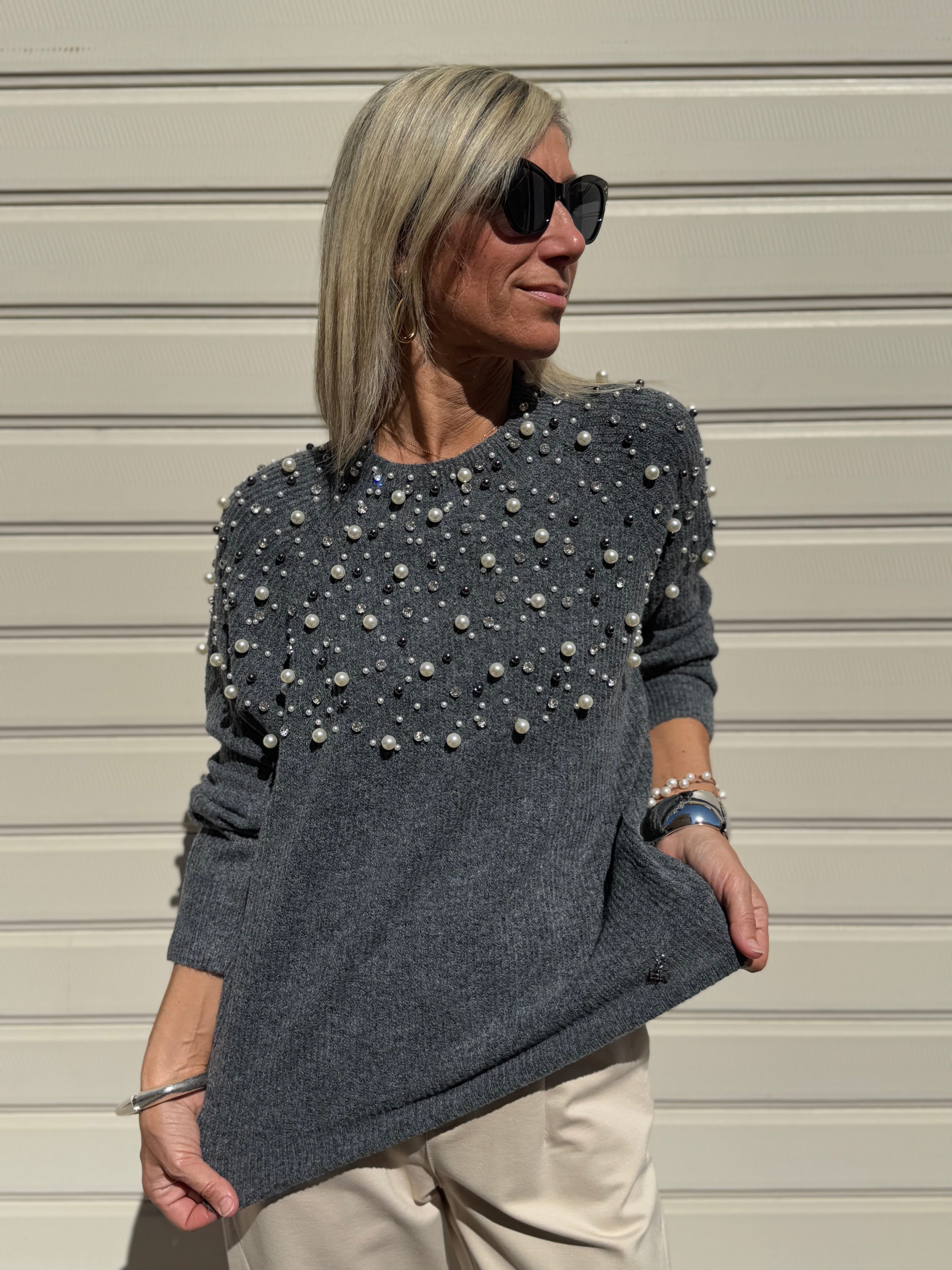 Maglia con perle artigli