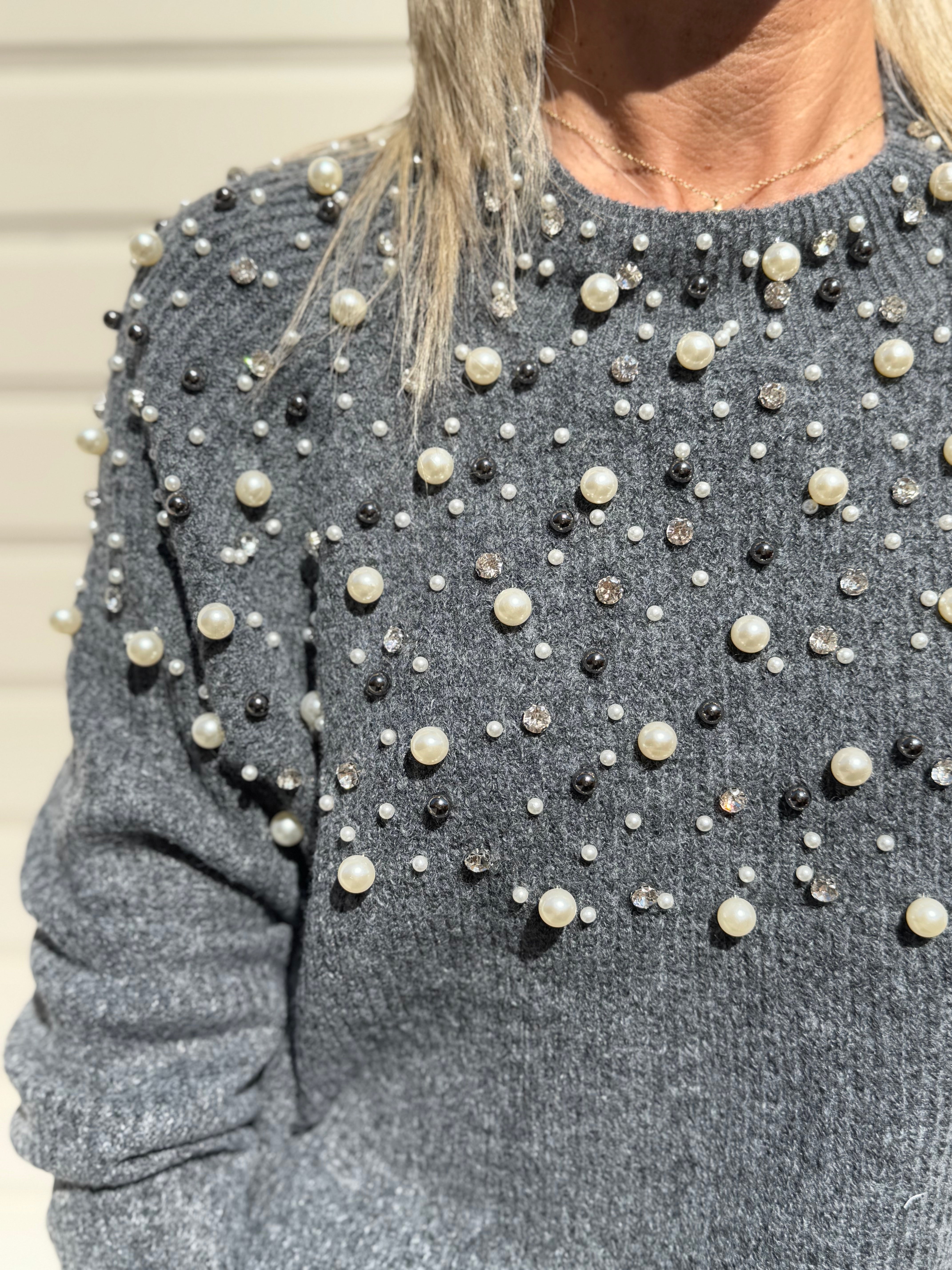 Maglia con perle artigli
