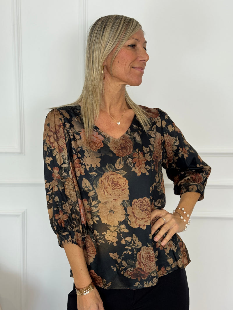 Blusa scollo V fantasia artigli
