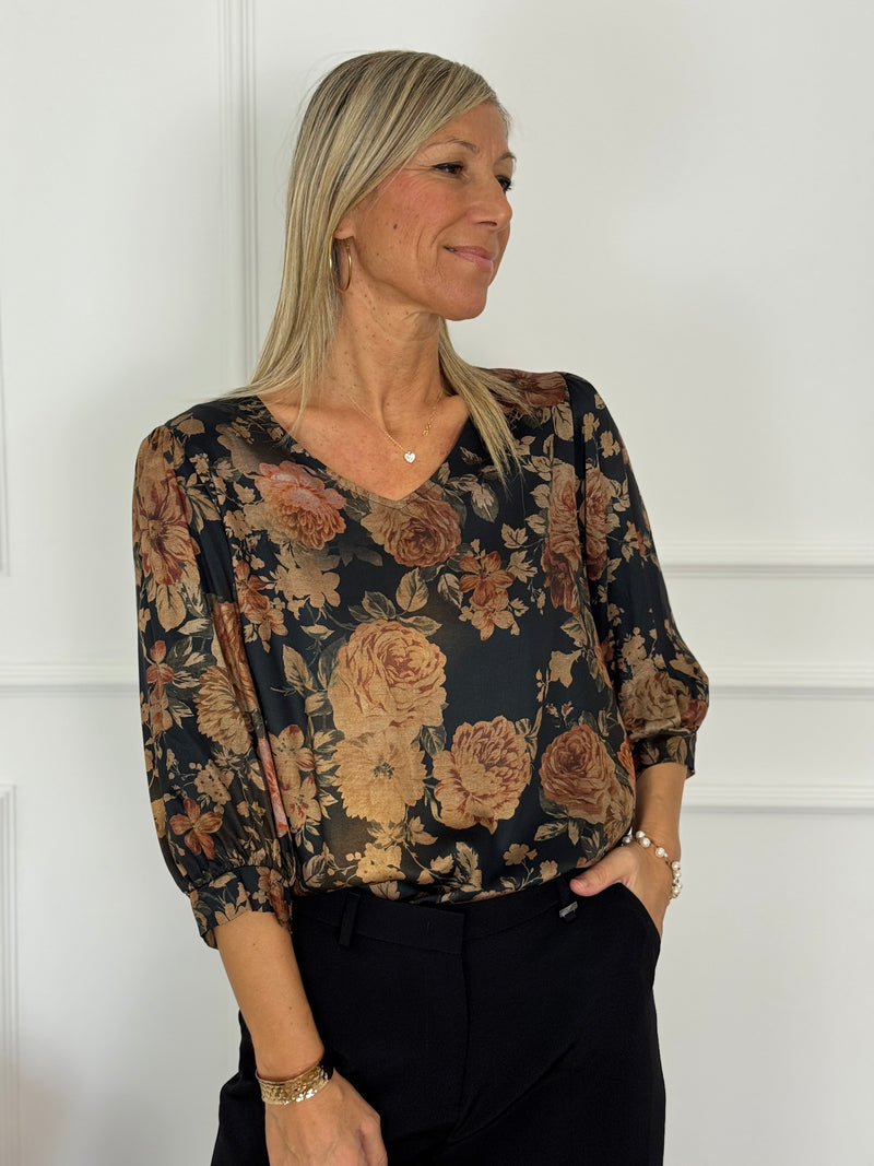 Blusa scollo V fantasia artigli