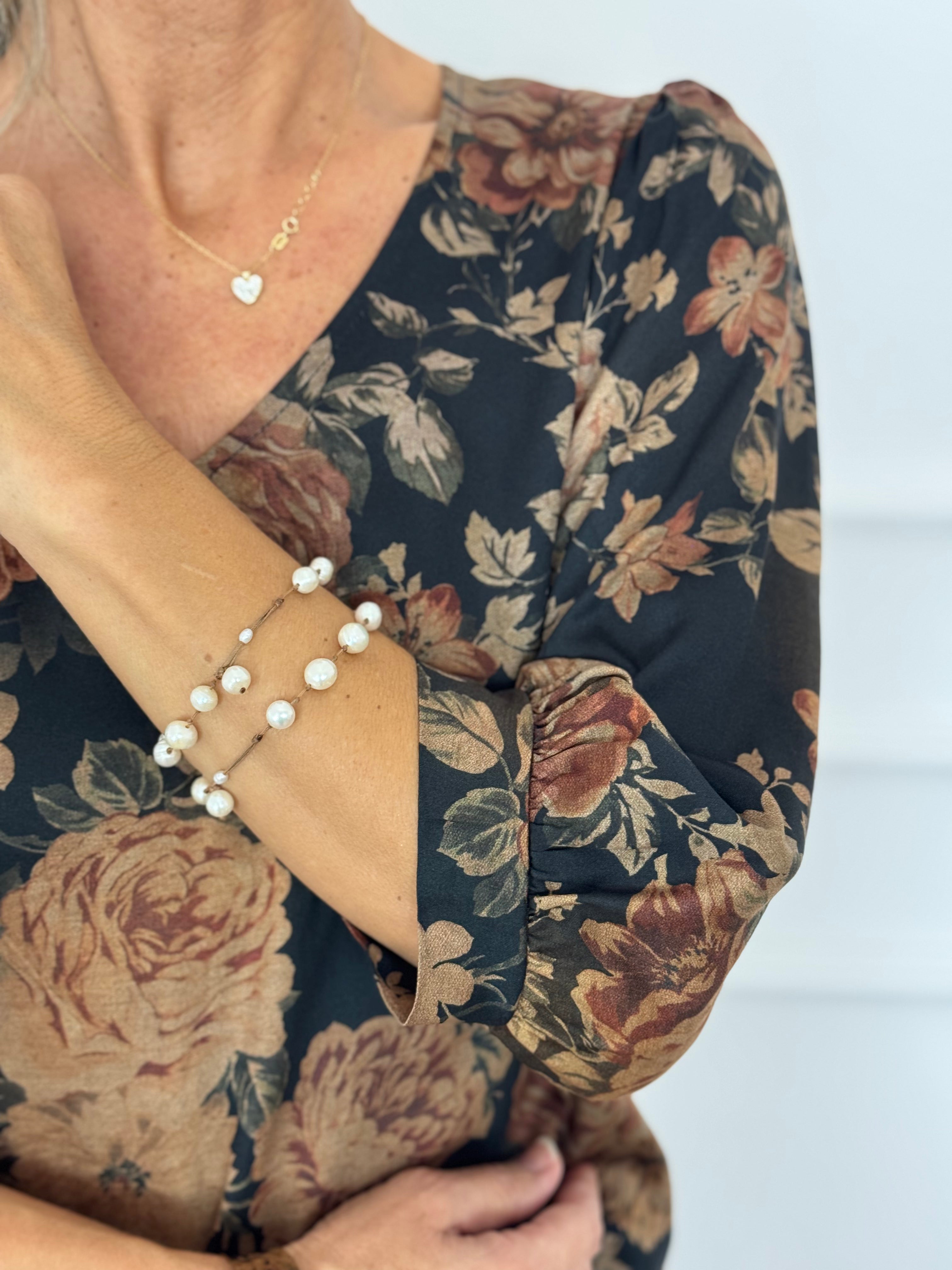 Blusa scollo V fantasia artigli