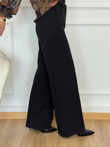 Pantalone palazzo artigli