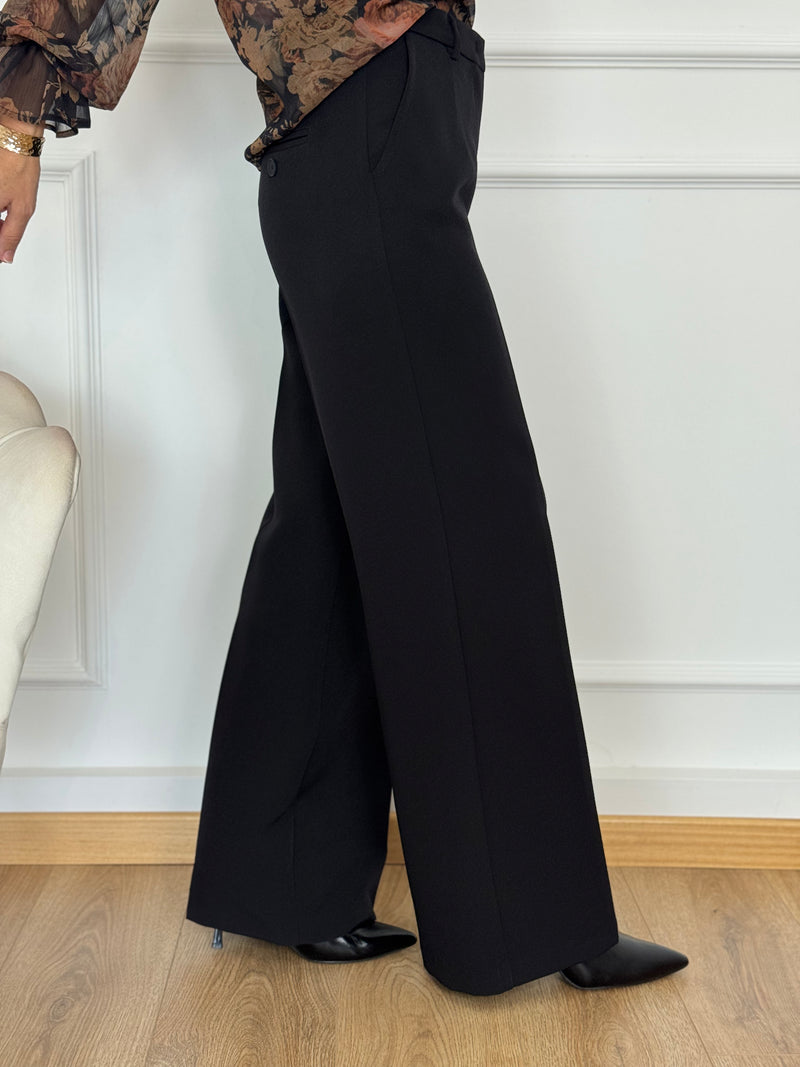 Pantalone palazzo artigli