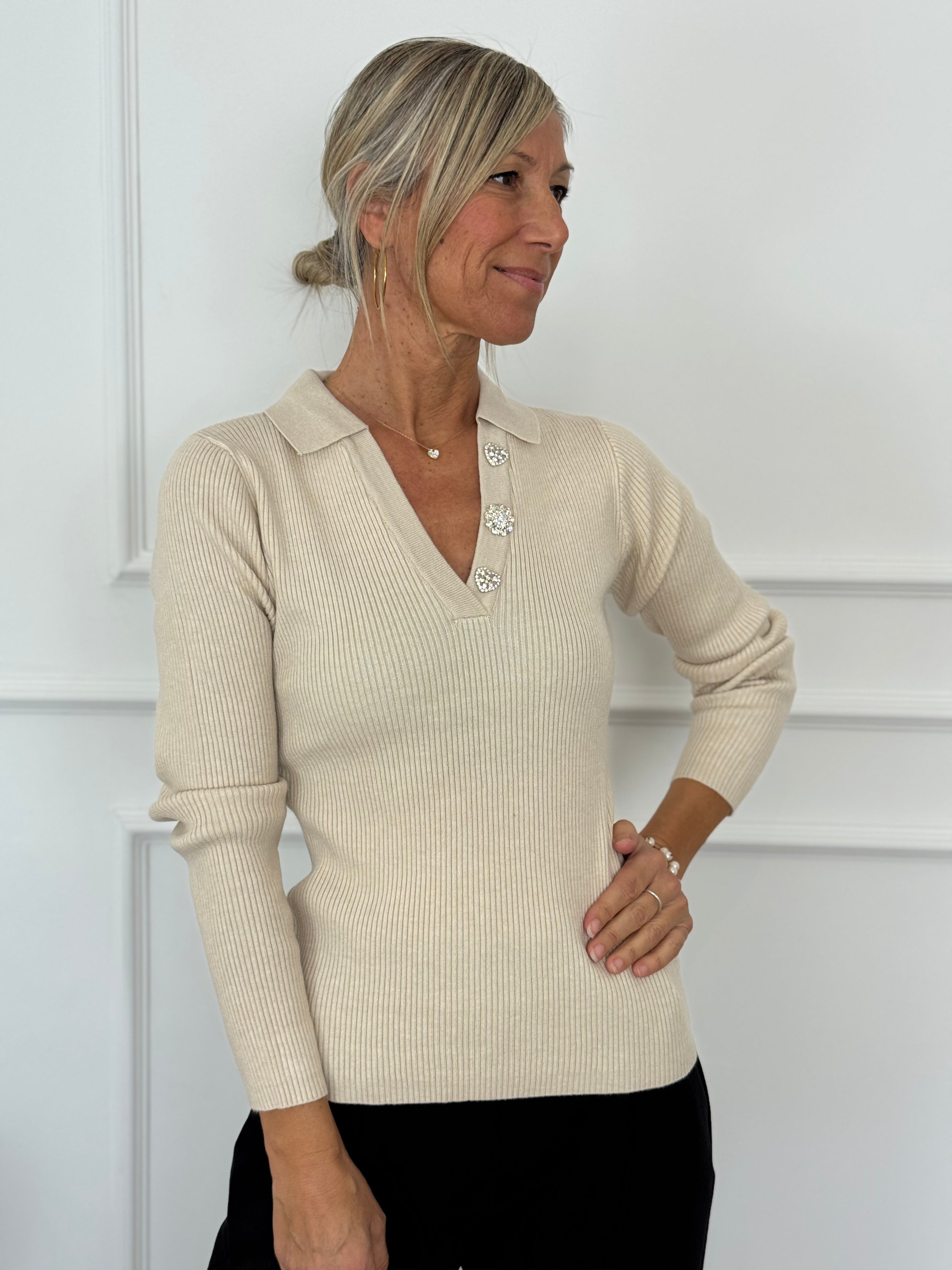 Polo bottoni strass artigli