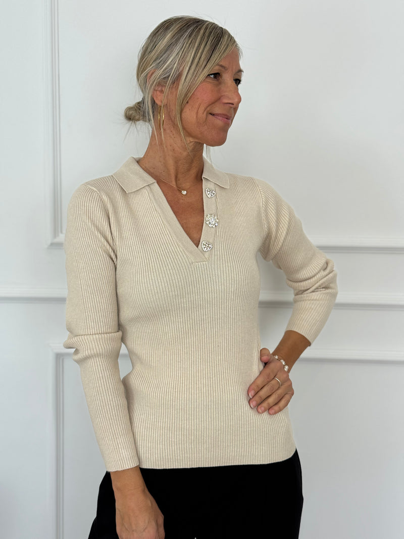 Polo bottoni strass artigli