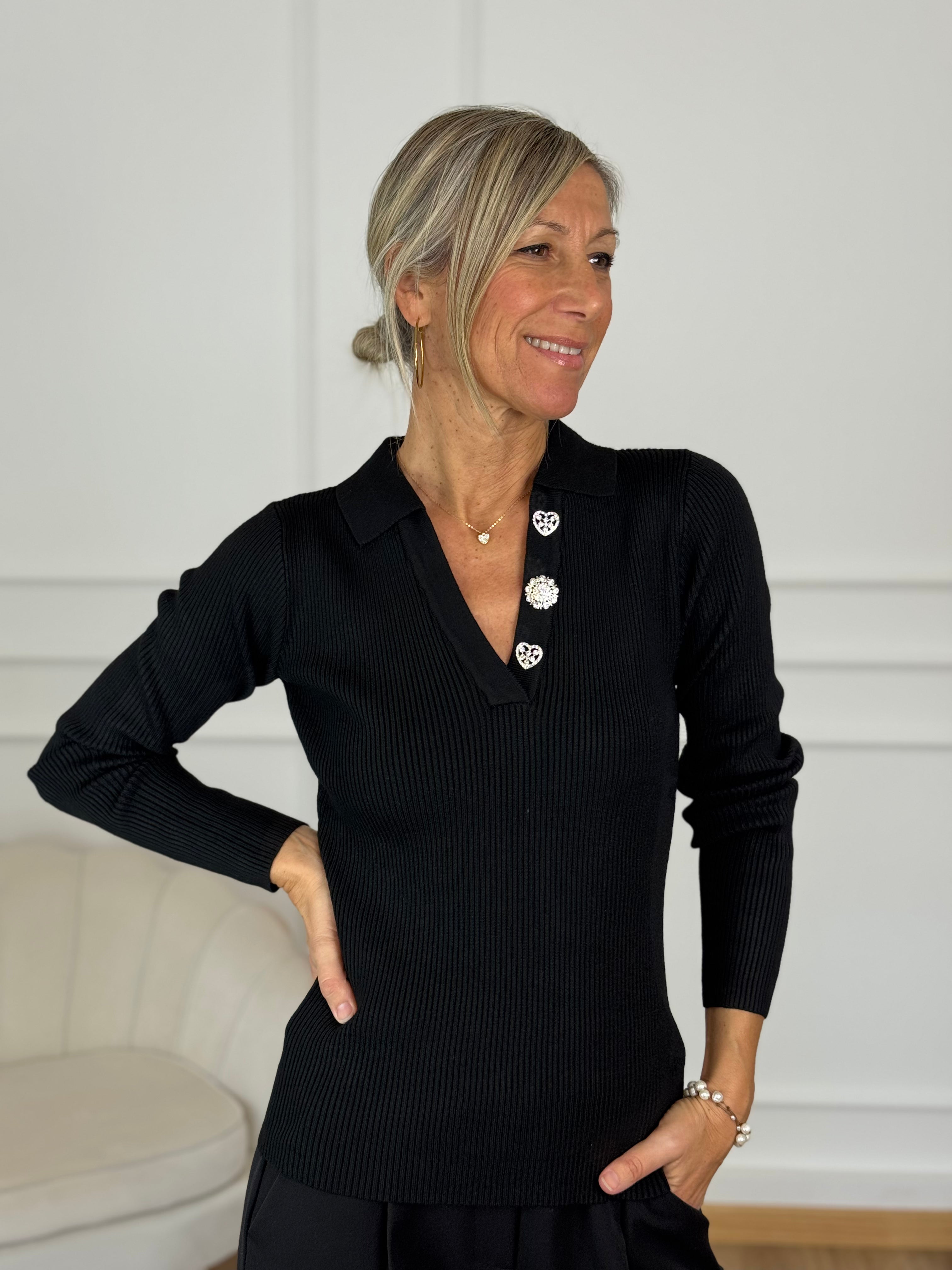 Polo bottoni strass artigli