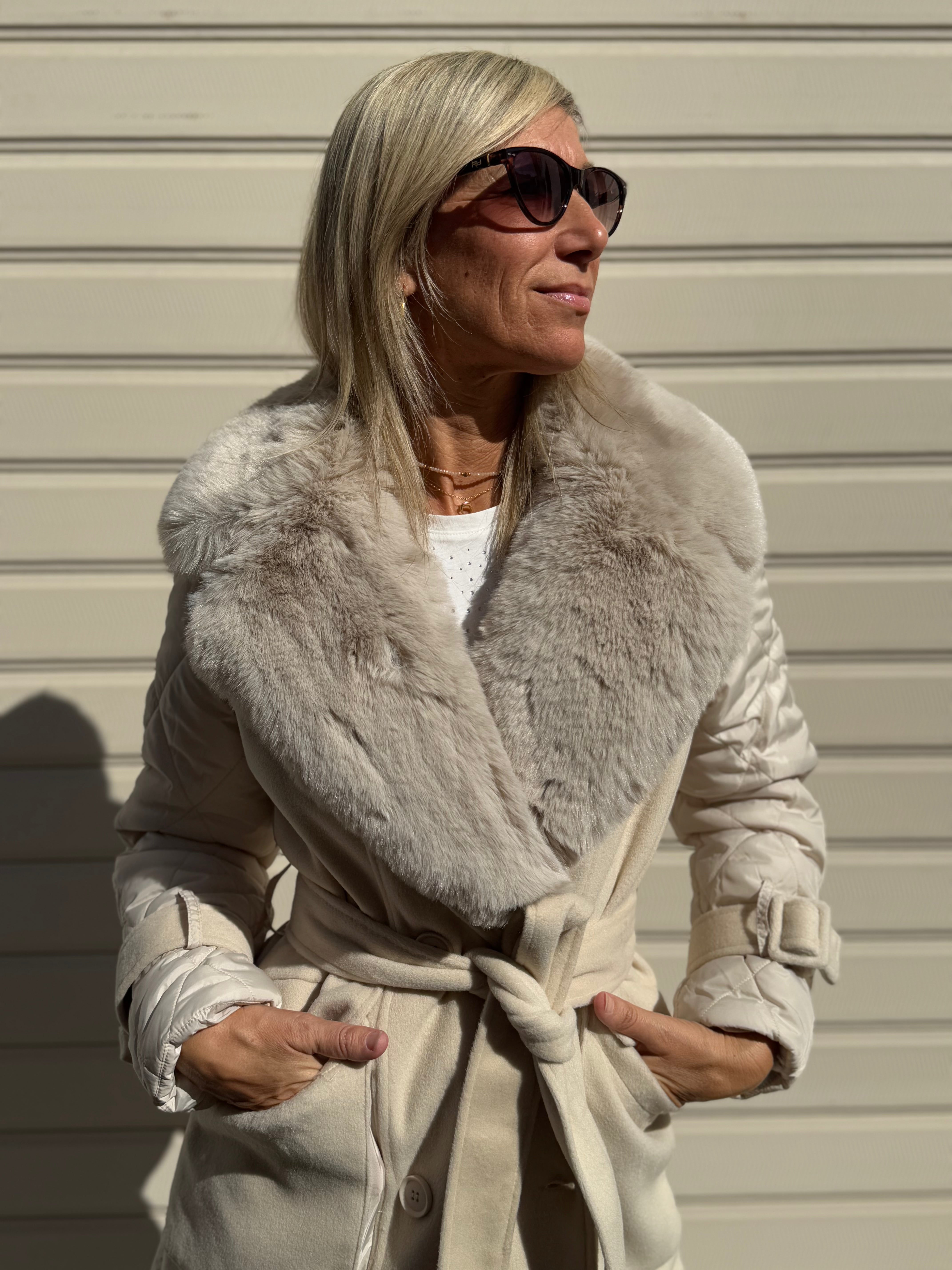Cappotto piumino artigli