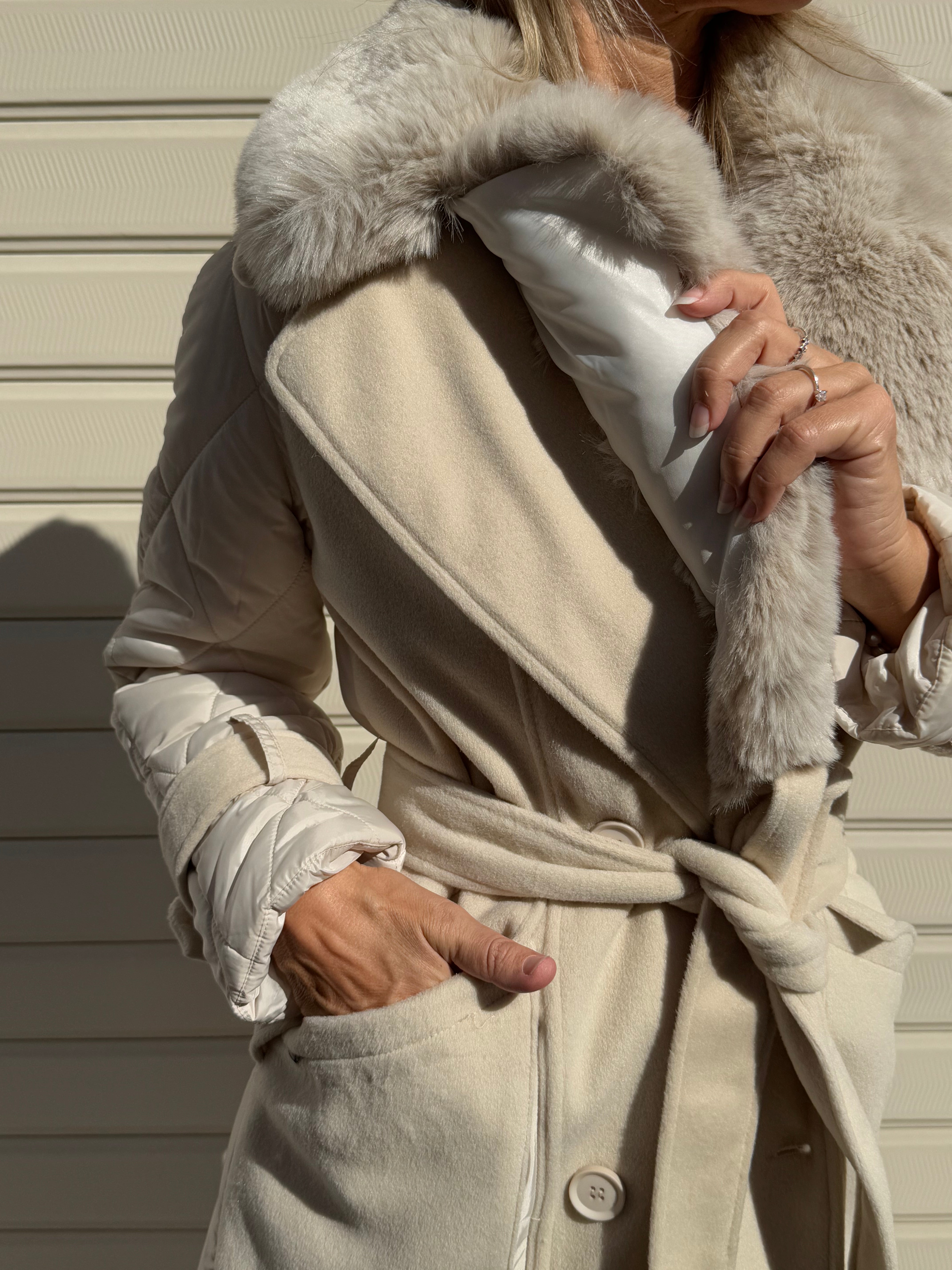 Cappotto piumino artigli