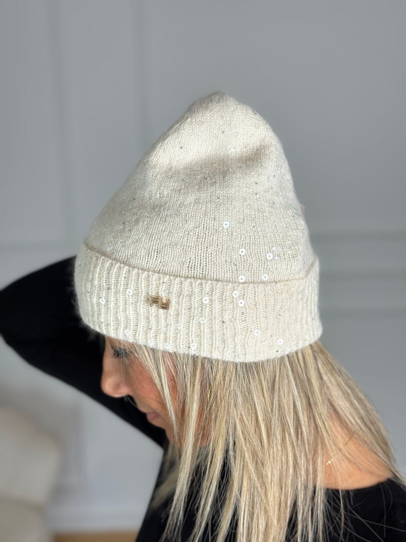 Cuffia paillettes artigli