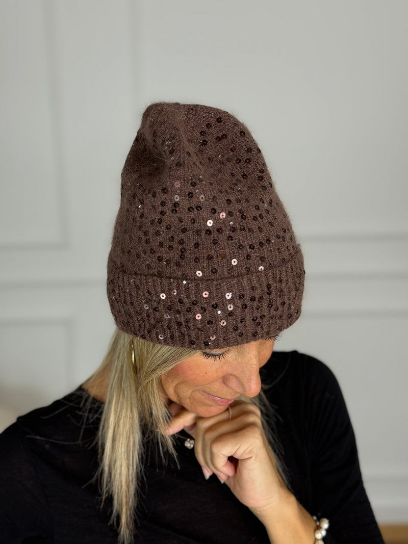 Cuffia paillettes artigli