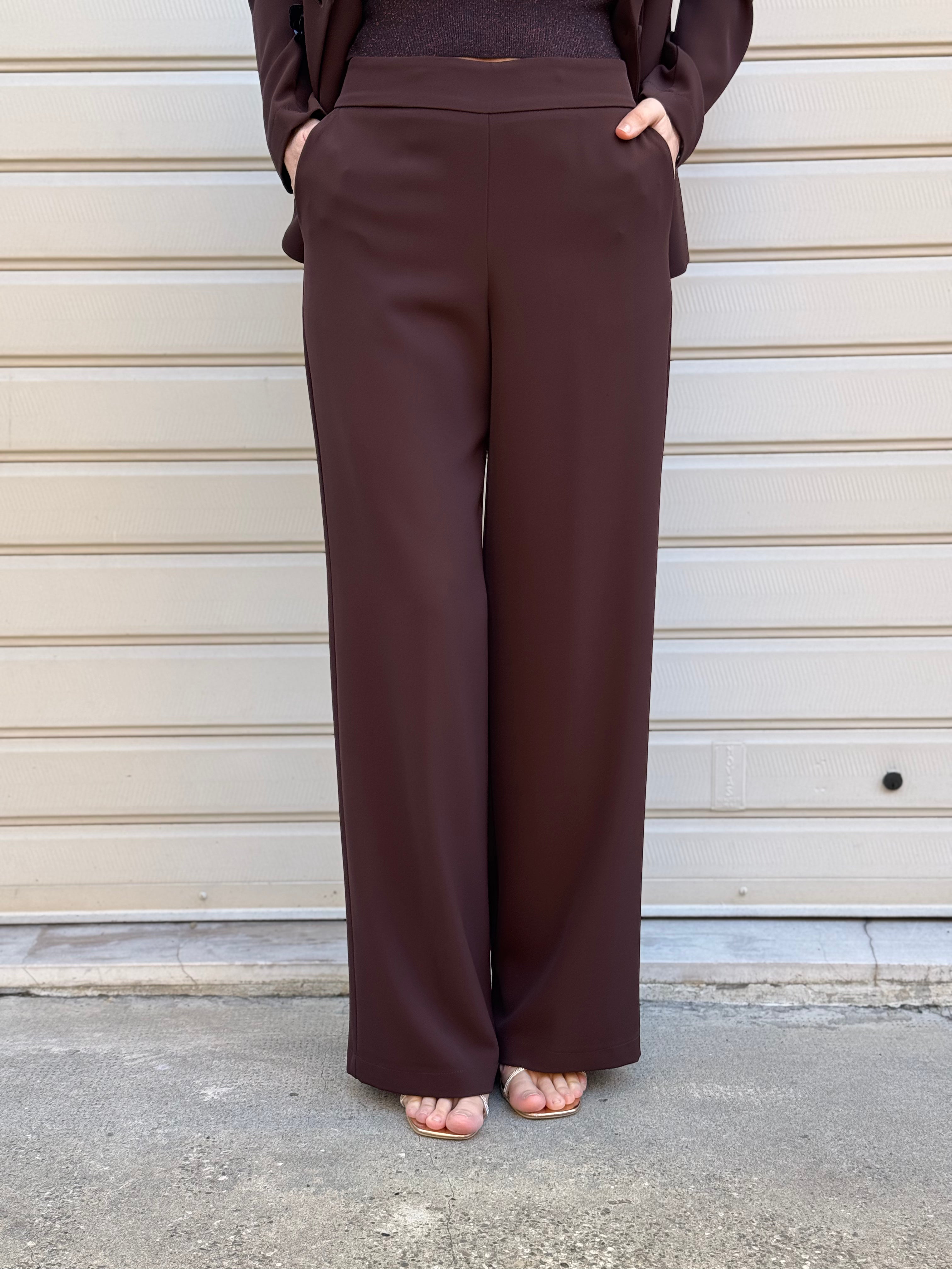 Tailleur fluido kontatto