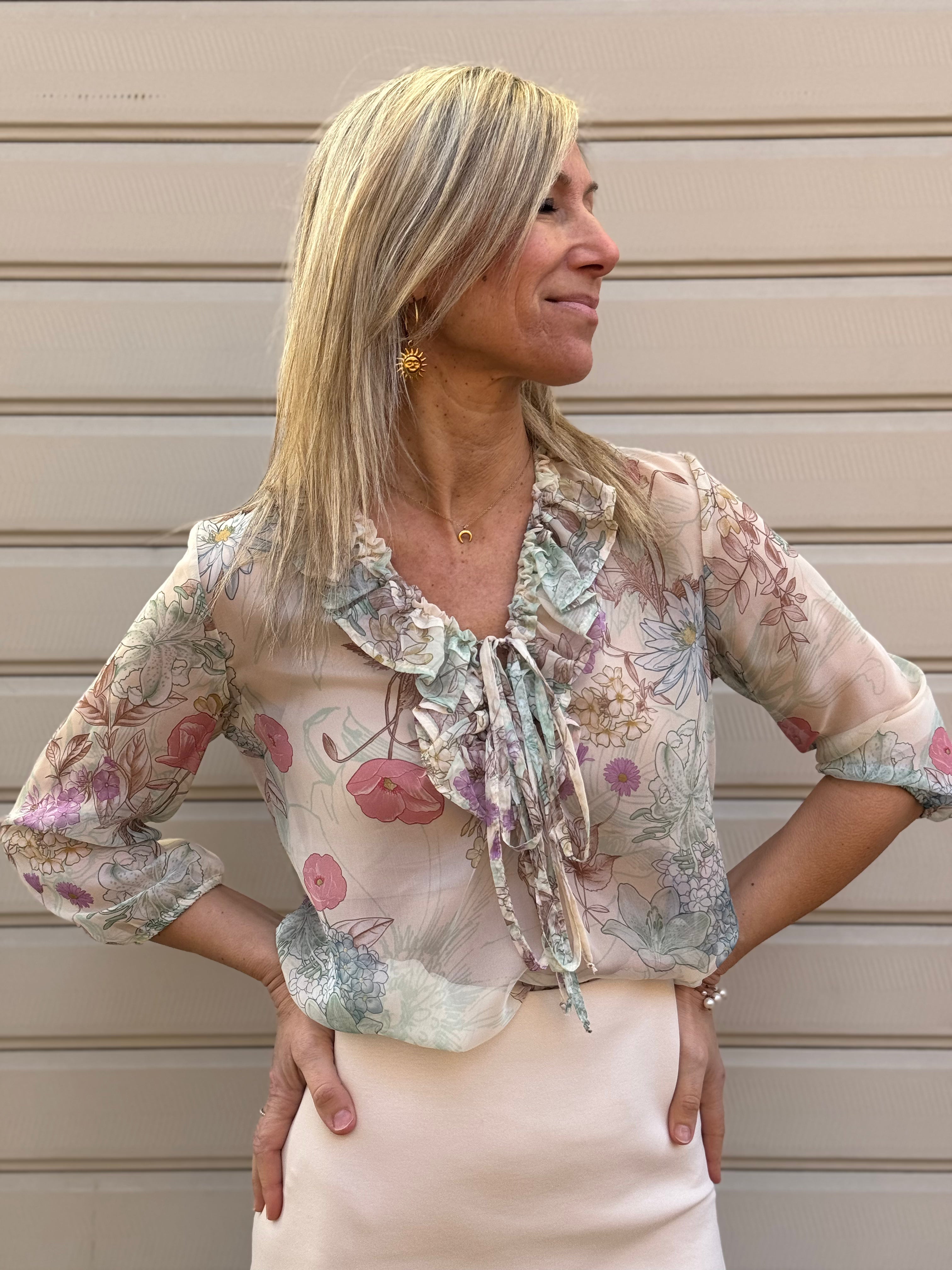 Blusa floreale con rouches mimì