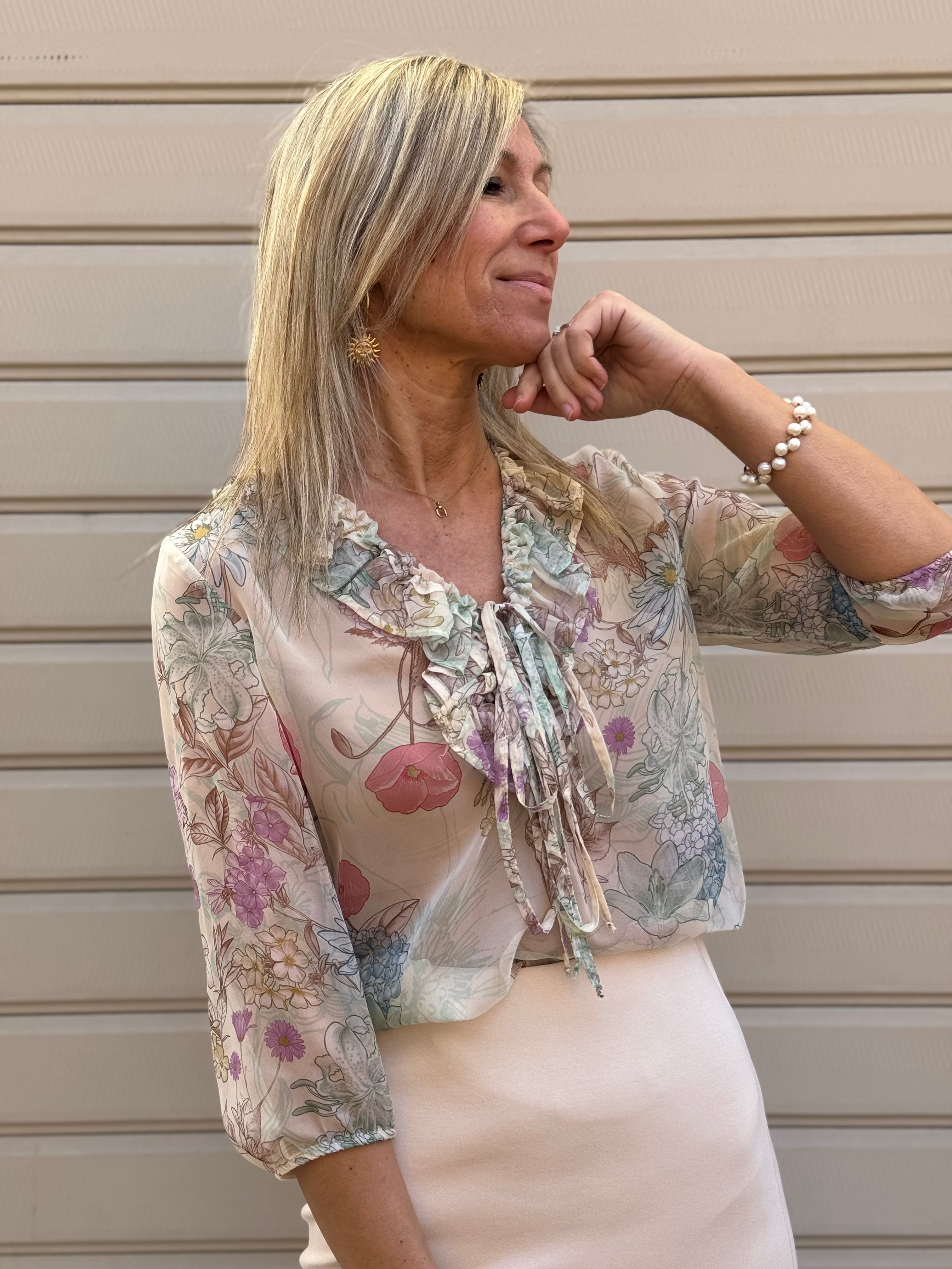 Blusa floreale con rouches mimì