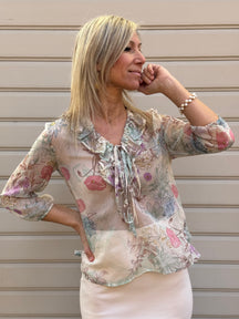 Blusa floreale con rouches mimì