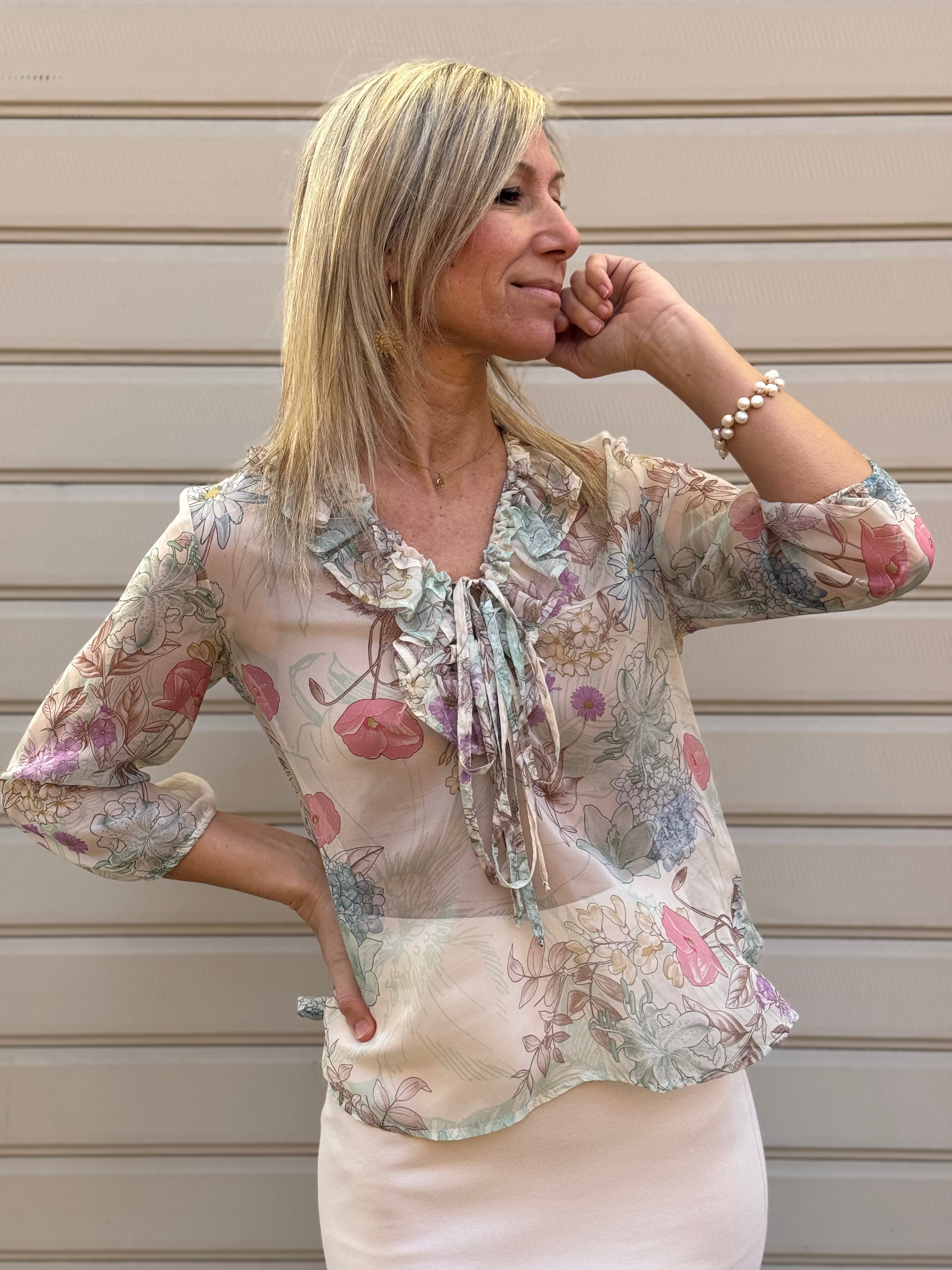 Blusa floreale con rouches mimì