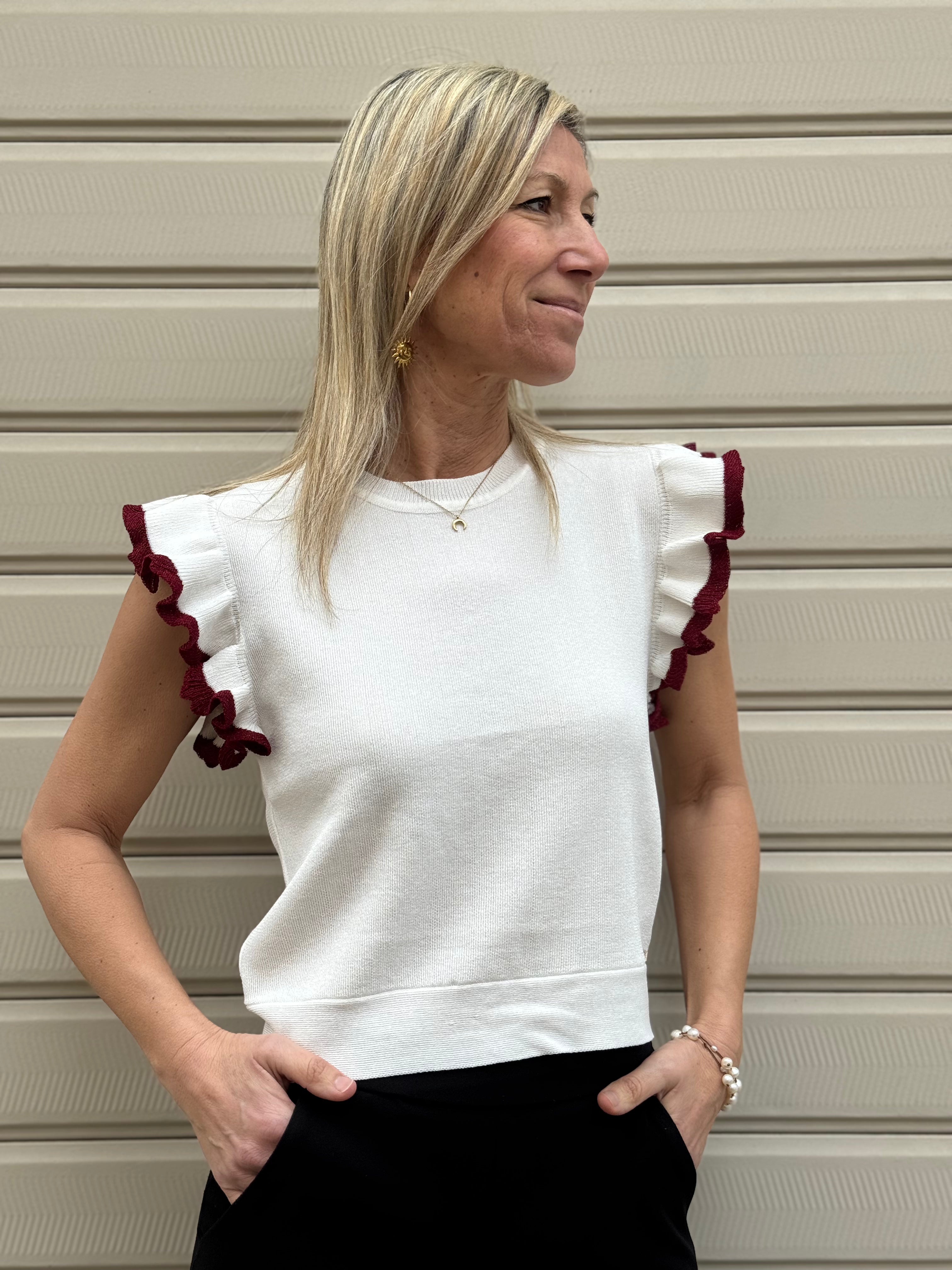 Maglia apertura schiena artigli