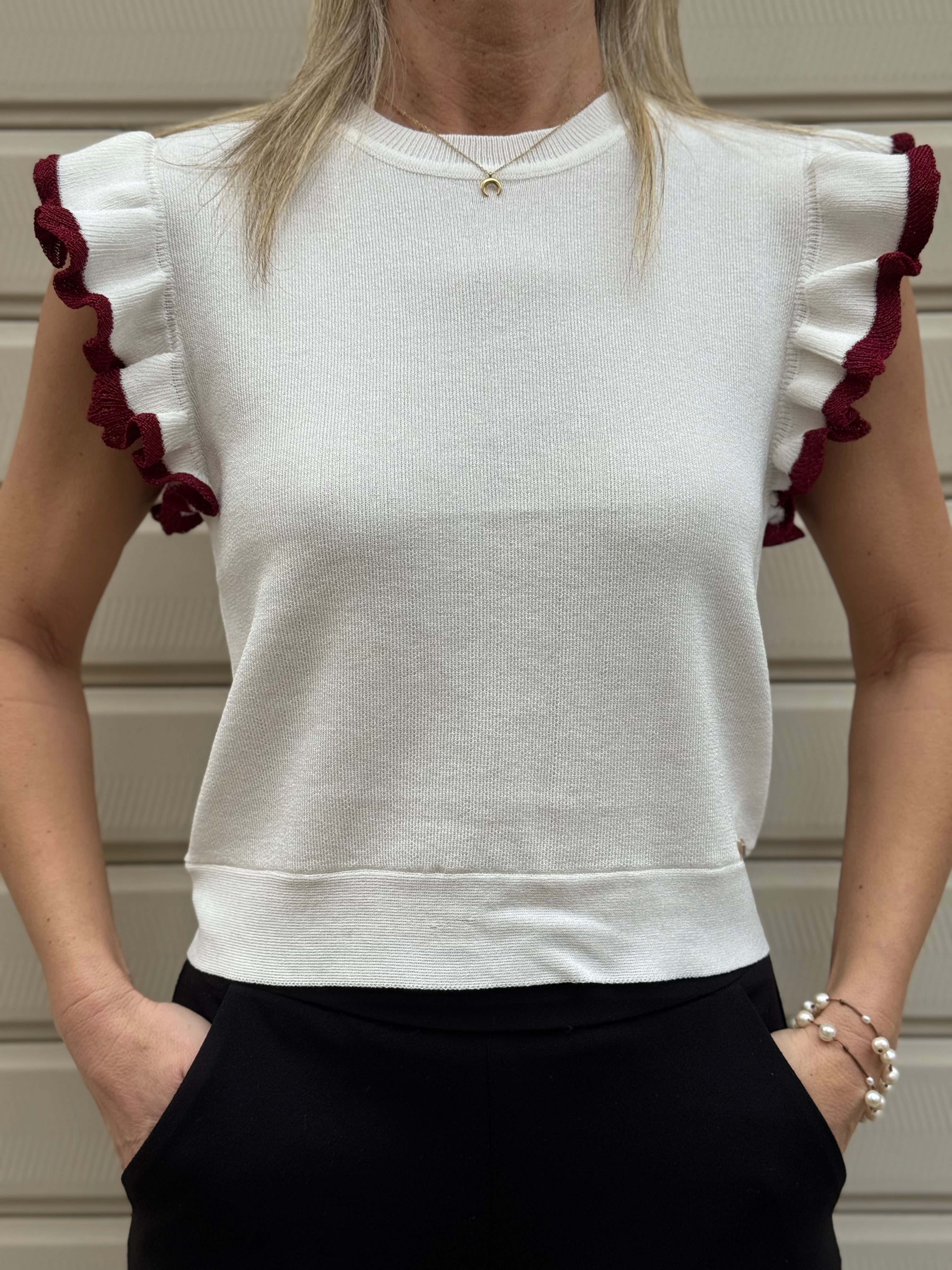 Maglia apertura schiena artigli